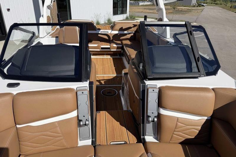 2026 Supra SL boat interior with tan leather seats and sleek design.