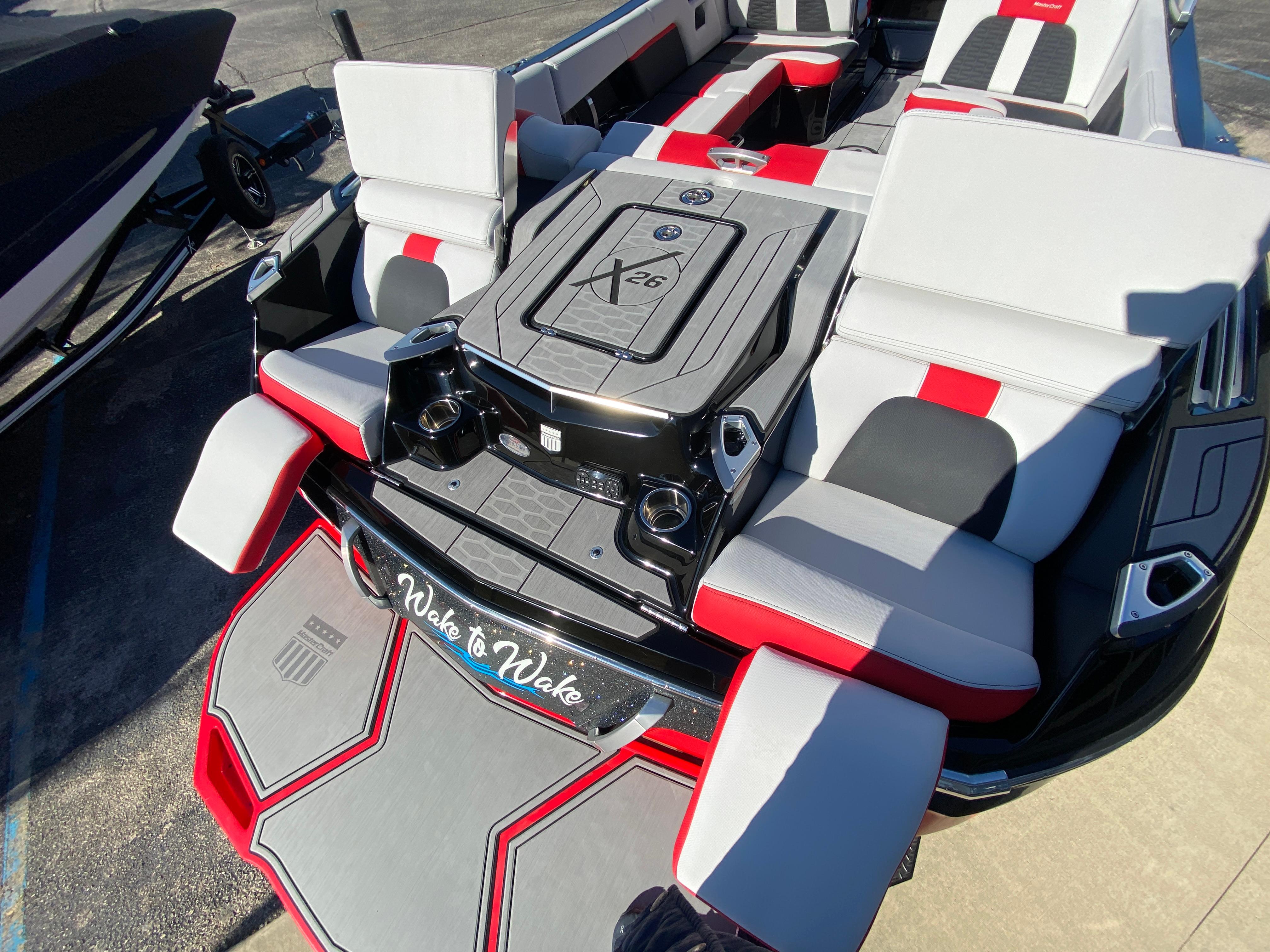 2021 MasterCraft X26 boat with stylish seating and modern design.