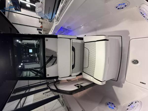 2025 Blackfin 272CC boat interior with white seating and modern design.
