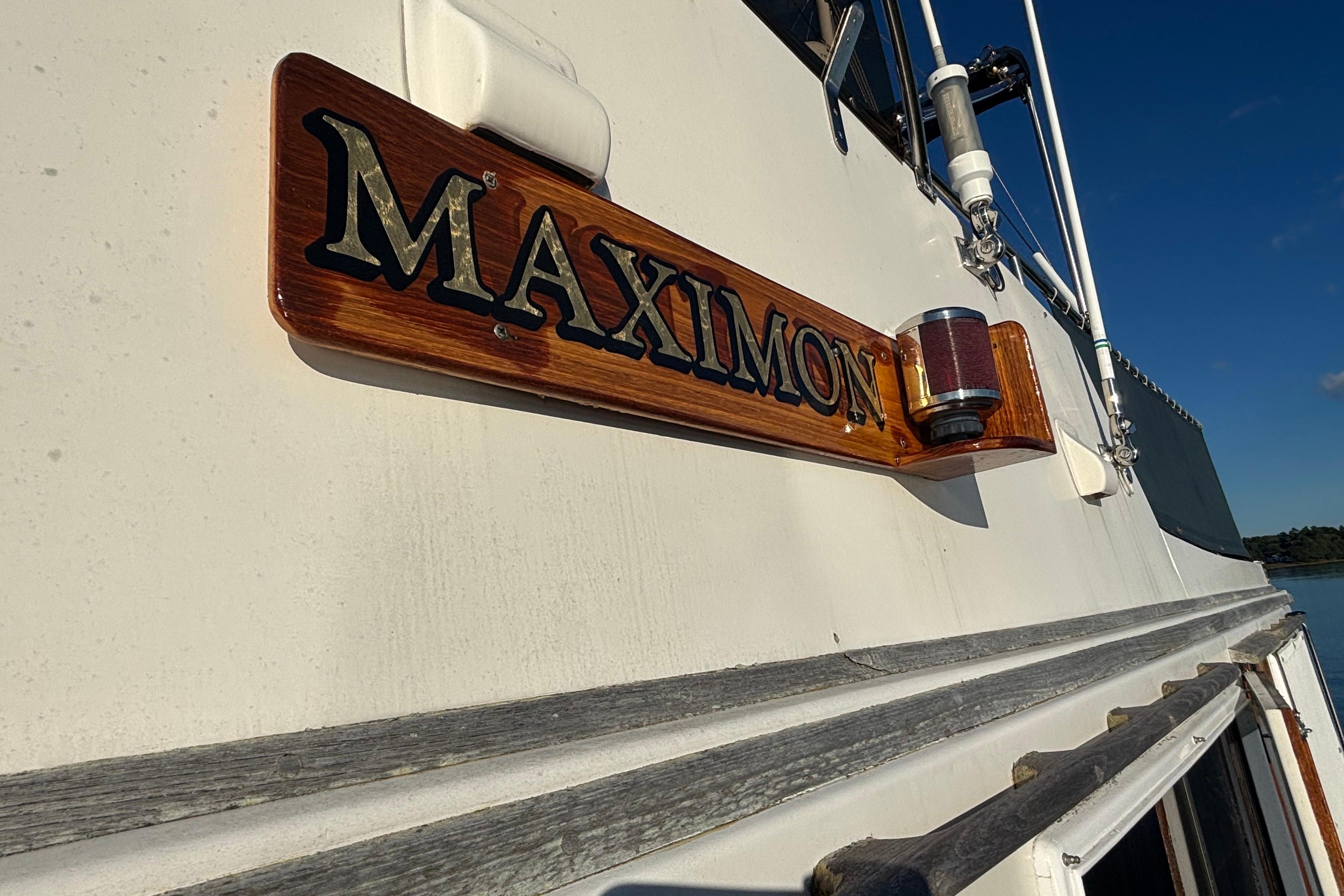 1989 Grand Banks 46 Classic boat with "Maximon" nameplate and exterior details.