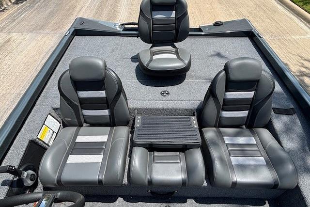 2026 Ranger RT188 boat interior with four black and gray cushioned seats.