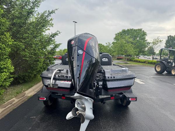 2025 Nitro Z20 XL Pro boat with powerful outboard motor in a parking lot.