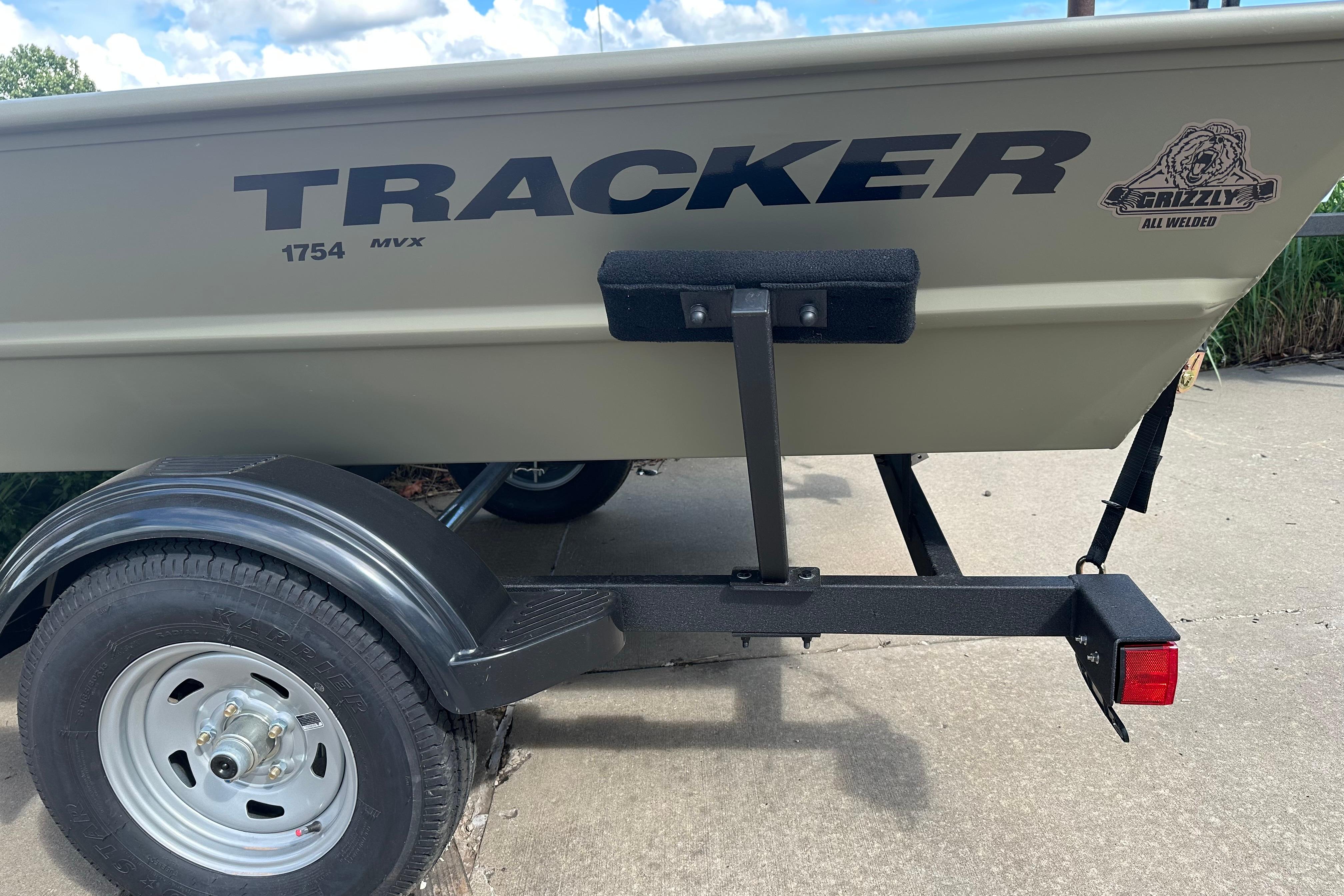 2026 Tracker Grizzly 1754 Utility boat on trailer, showcasing durable all-welded design.