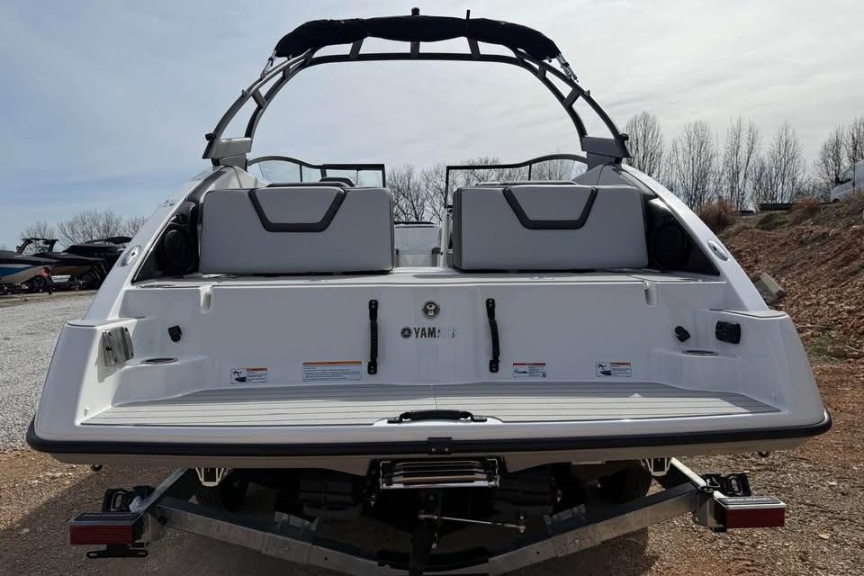 2026 Yamaha Boats AR250 rear view, showcasing sleek design and spacious seating.