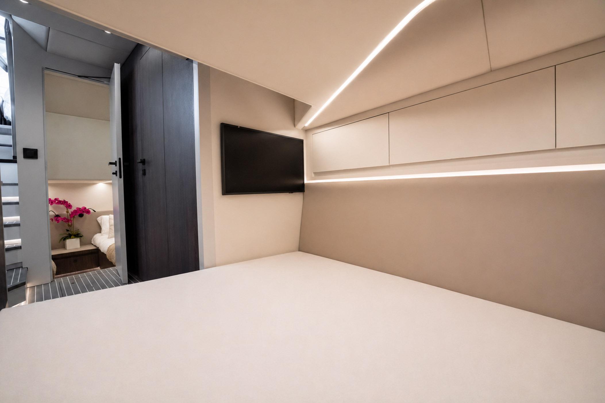 Luxurious interior of 2026 Vanquish 55 Veloce yacht with modern design and ambient lighting.
