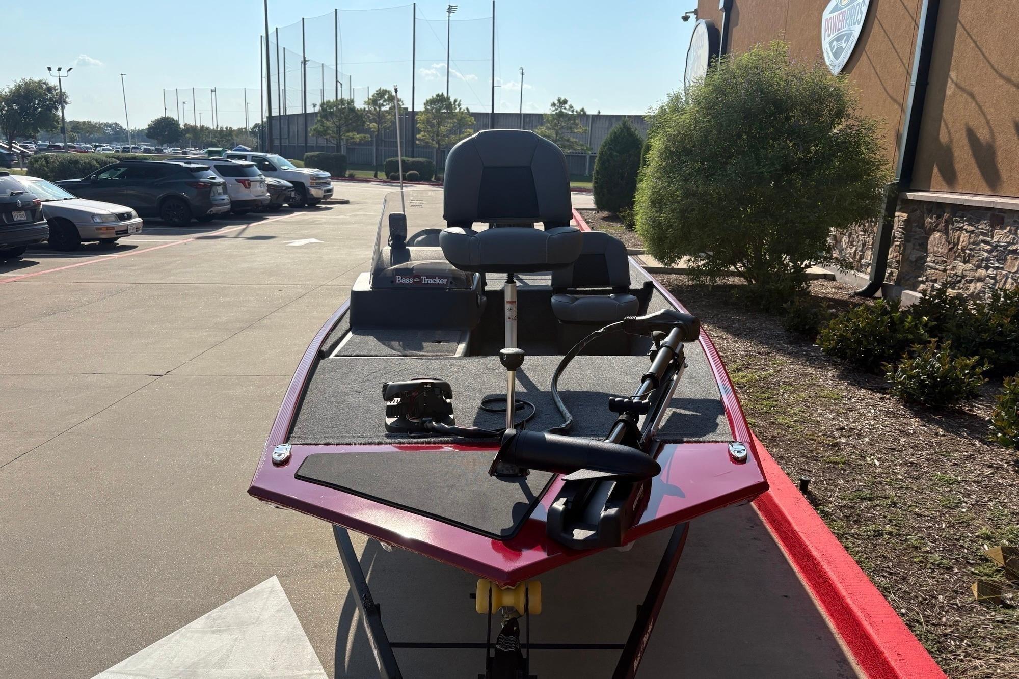 2026 Tracker Bass Tracker Classic XL boat parked outdoors, showcasing sleek design and modern features.