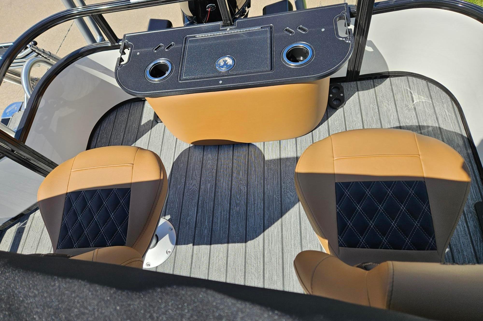 Interior of 2026 Ranger 223F boat with stylish seating and console design.