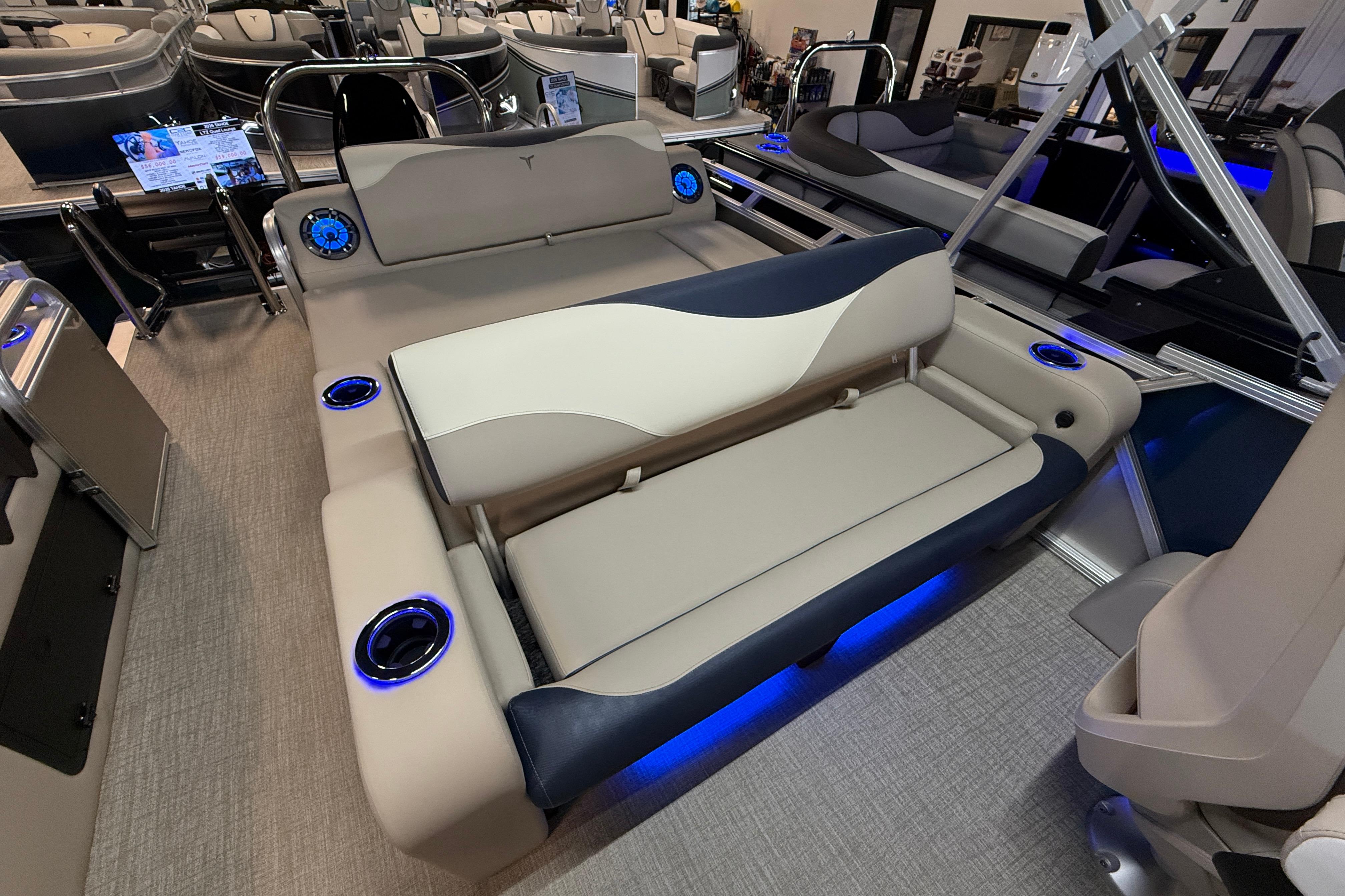 2026 Tahoe Pontoon LTZ Quad Lounger Shift with illuminated cup holders and luxurious seating.
