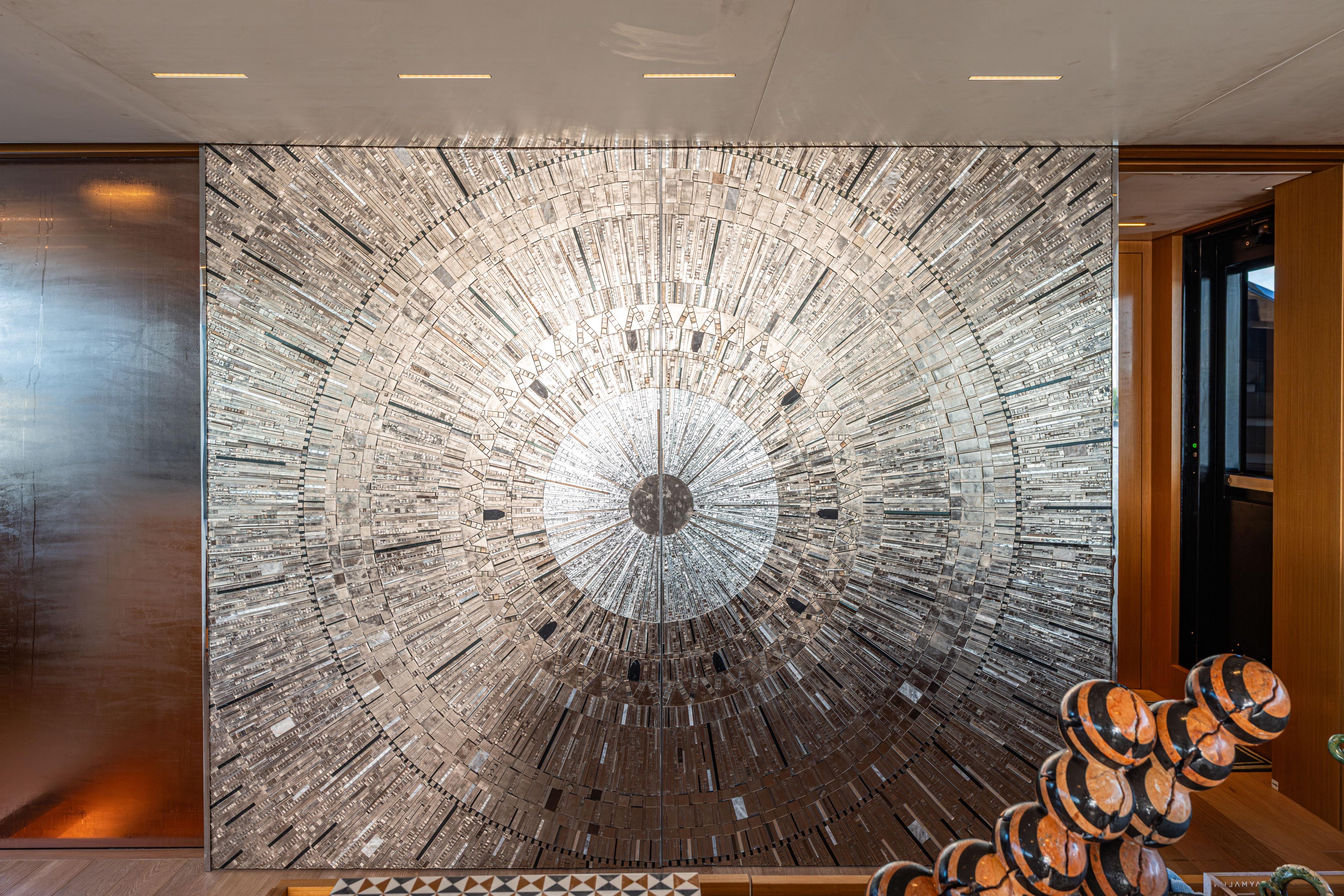 Decorative metallic wall art on Sanlorenzo SL120A yacht, 2023 model.