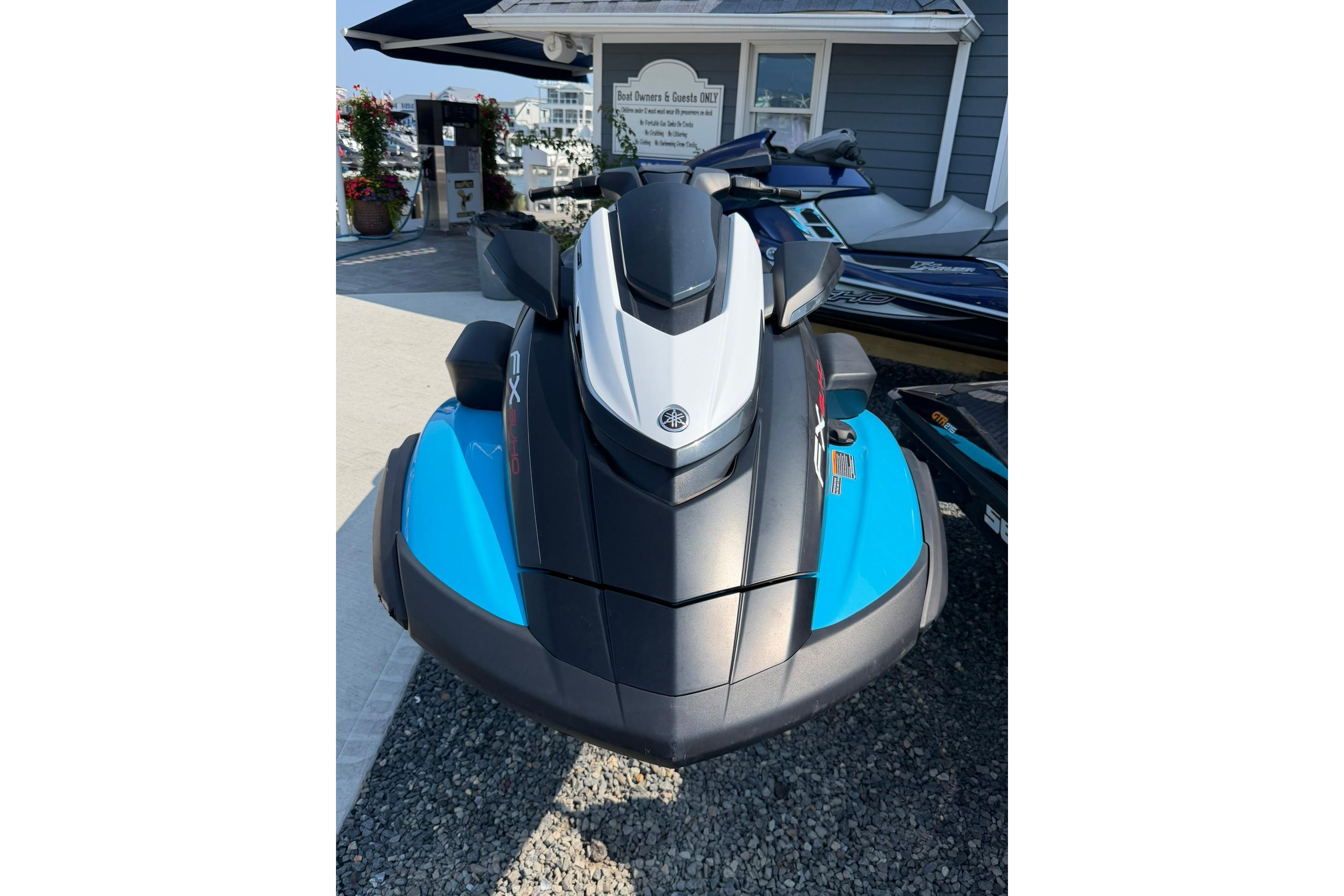 2025 Yamaha WaveRunner FX SVHO in blue and black, parked outdoors.
