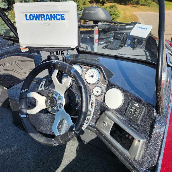 2024 Nitro ZV20 Pro boat dashboard with Lowrance electronics and modern steering wheel.