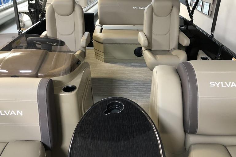Interior of 2027 Sylvan Mirage 820 CLZ DH pontoon boat with luxurious seating and modern design.