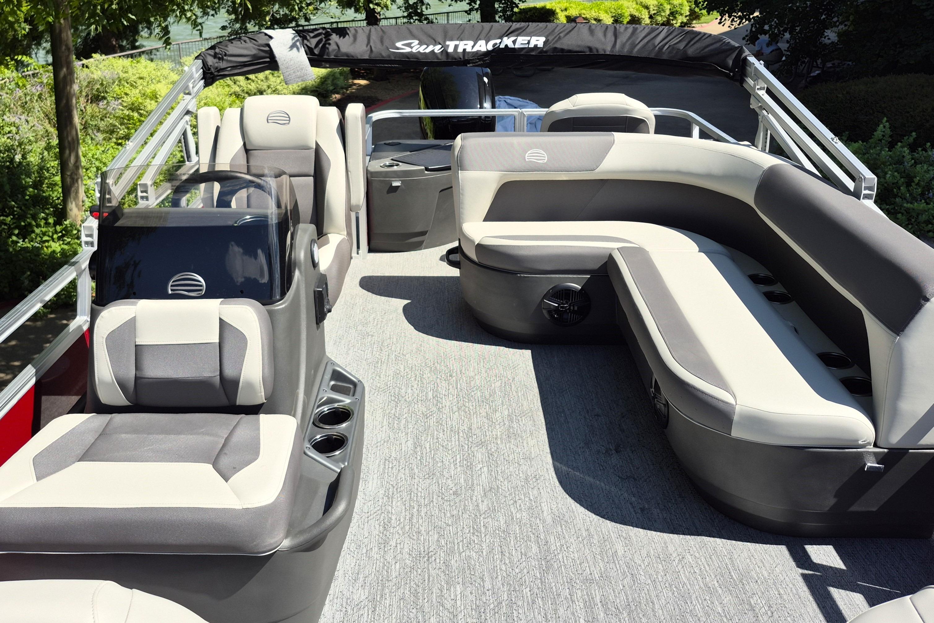 2026 Sun Tracker Bass Buggy 18 DLX pontoon boat interior with plush seating and modern design.