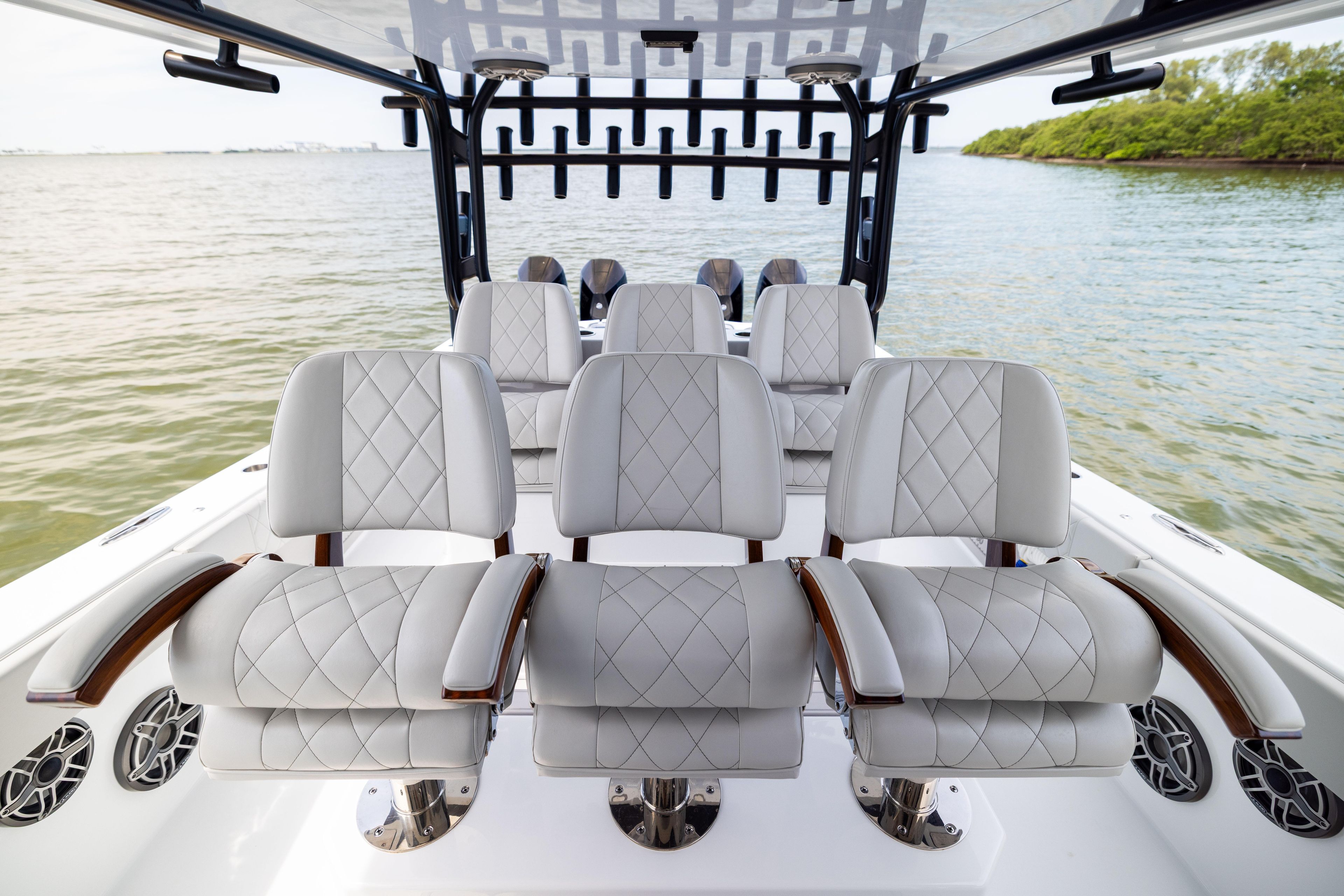Luxurious seating on the 2025 Freeman 42 LR boat, featuring elegant design and waterfront view.