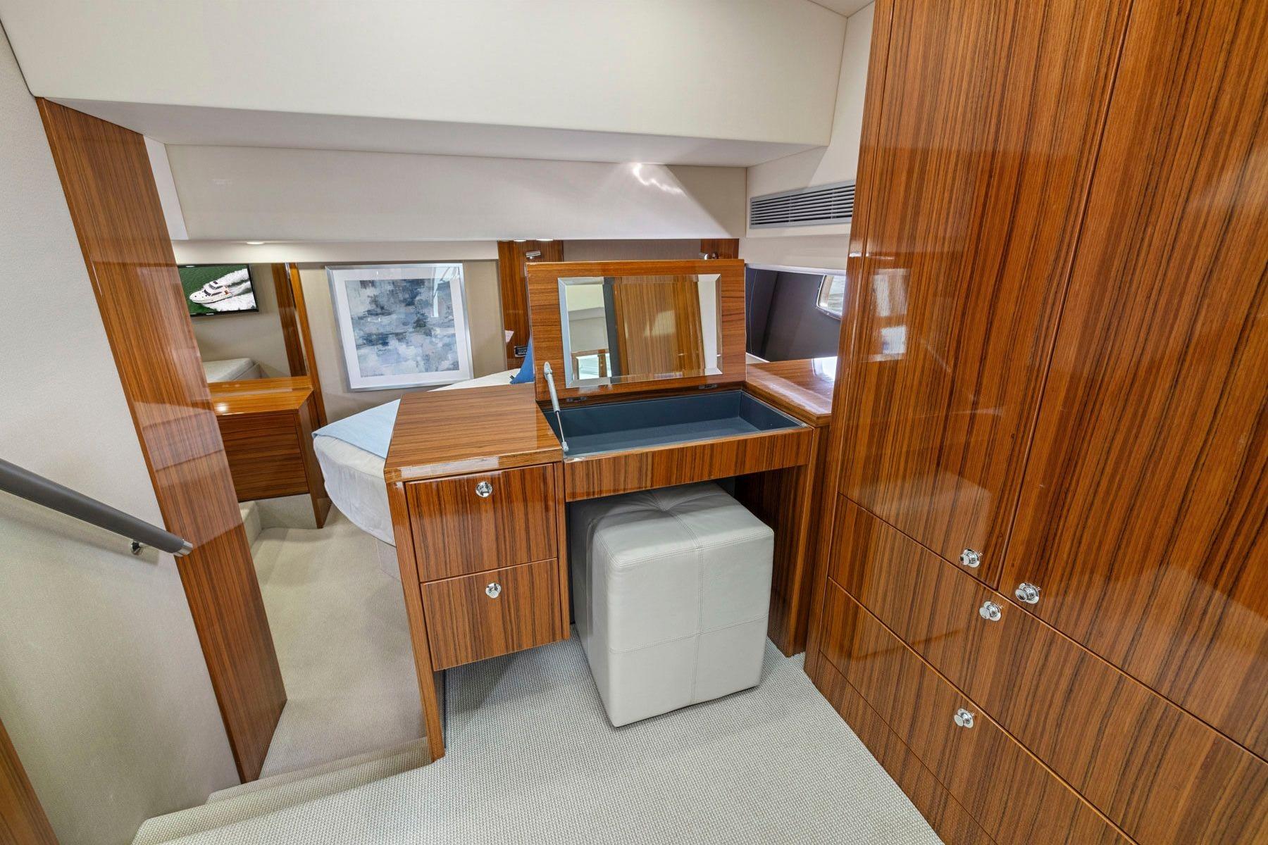 Luxurious interior of 2014 Maritimo M50 yacht with elegant wood finish and modern amenities.