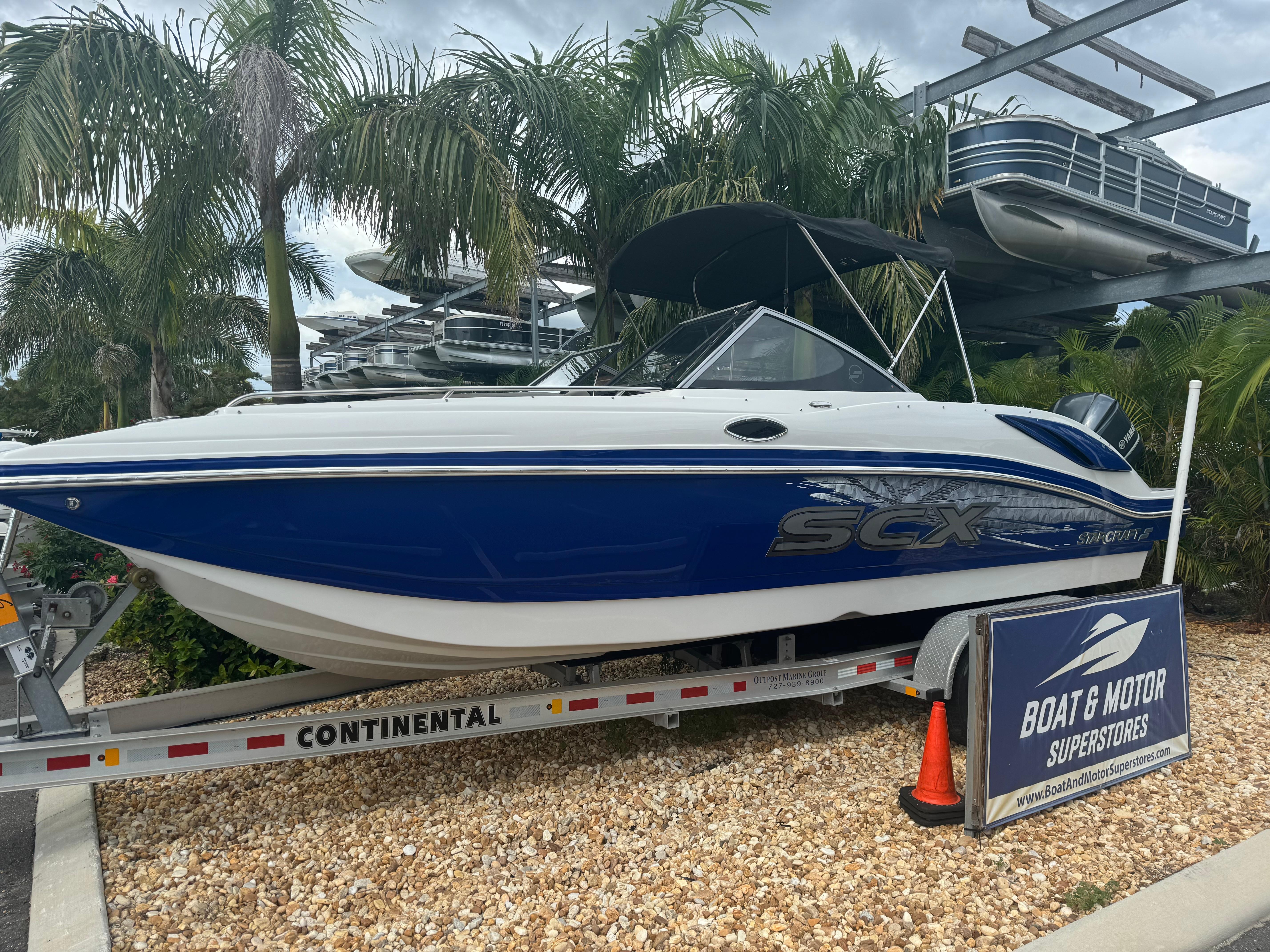 2017 Starcraft 230 OB SCX EXT boat on trailer, displayed at Boat & Motor Superstores.