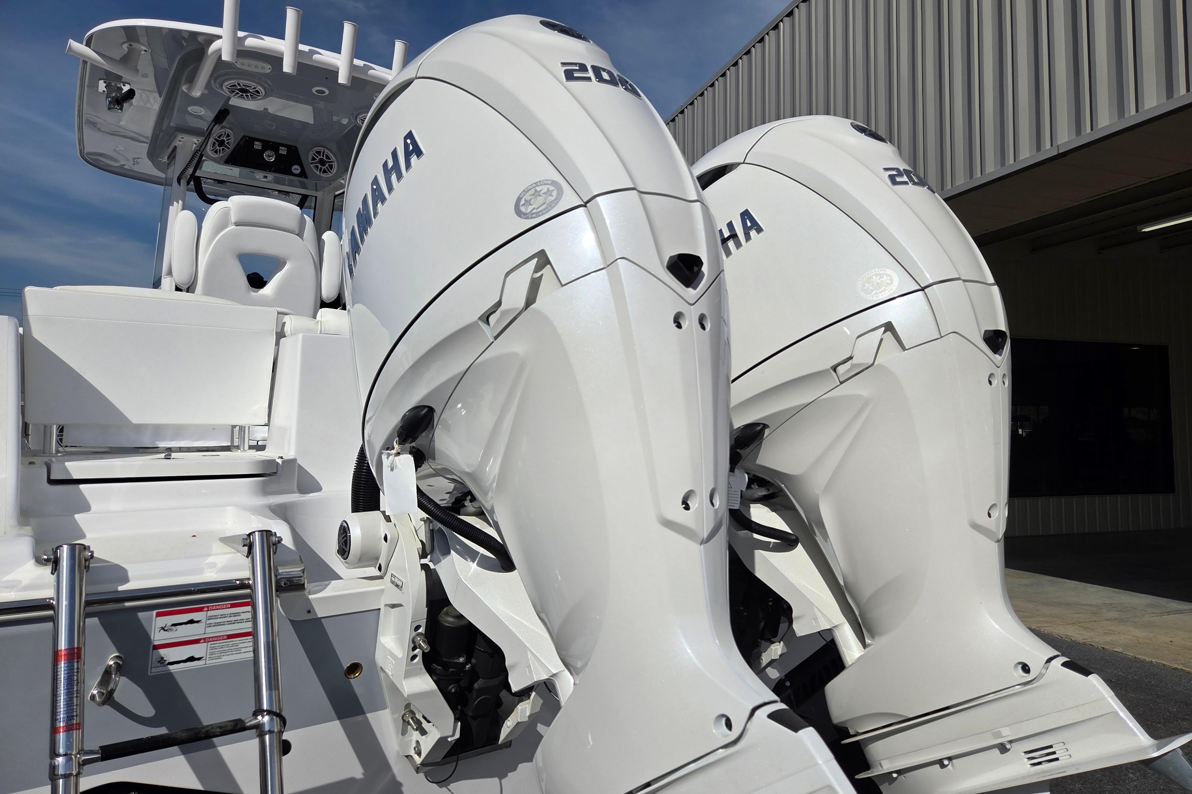 2026 Sportsman Heritage 261 Center Console with dual Yamaha outboard engines.