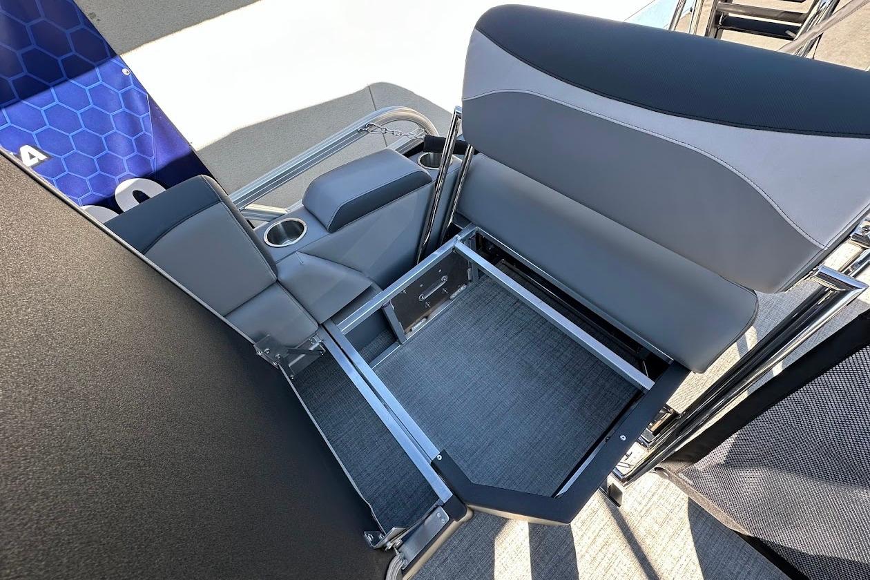 2026 Tahoe Pontoon LTZ Quad Lounger Shift 23 interior seating with storage compartment.
