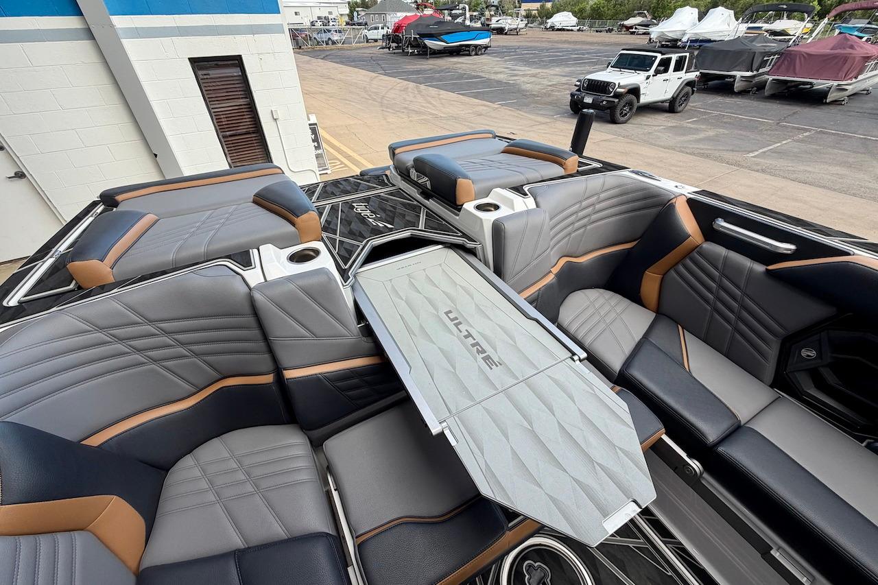 Luxurious interior of 2025 Tigé Ultré 25ZX boat with stylish seating and modern design.