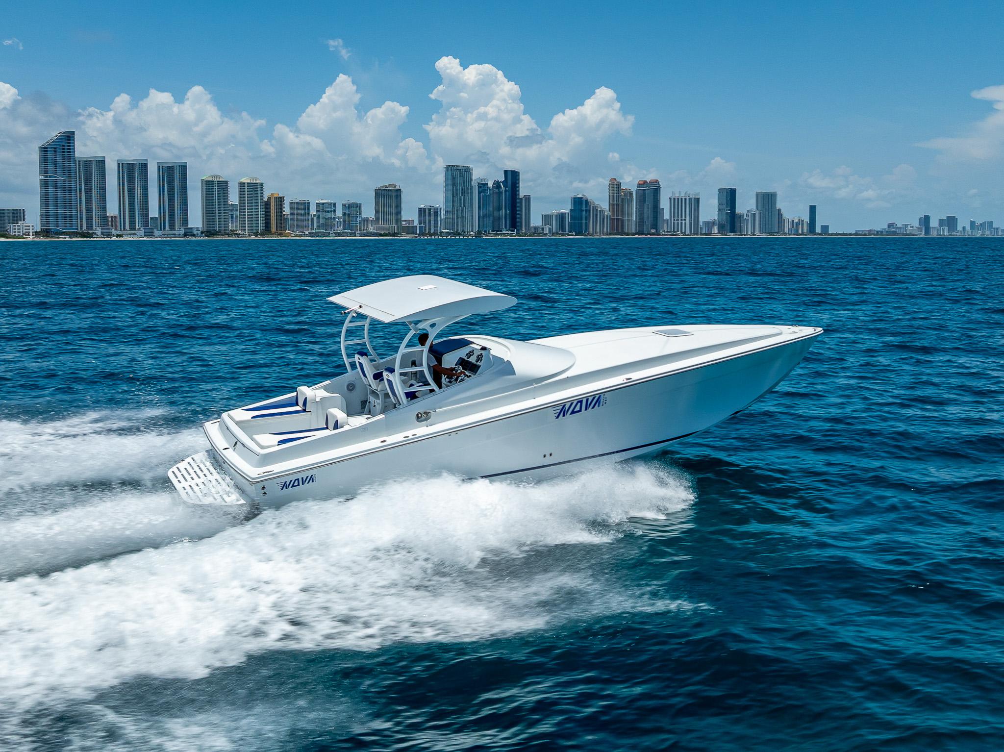 Nova 39 Sport 2020 speedboat cruising on ocean with city skyline in background.