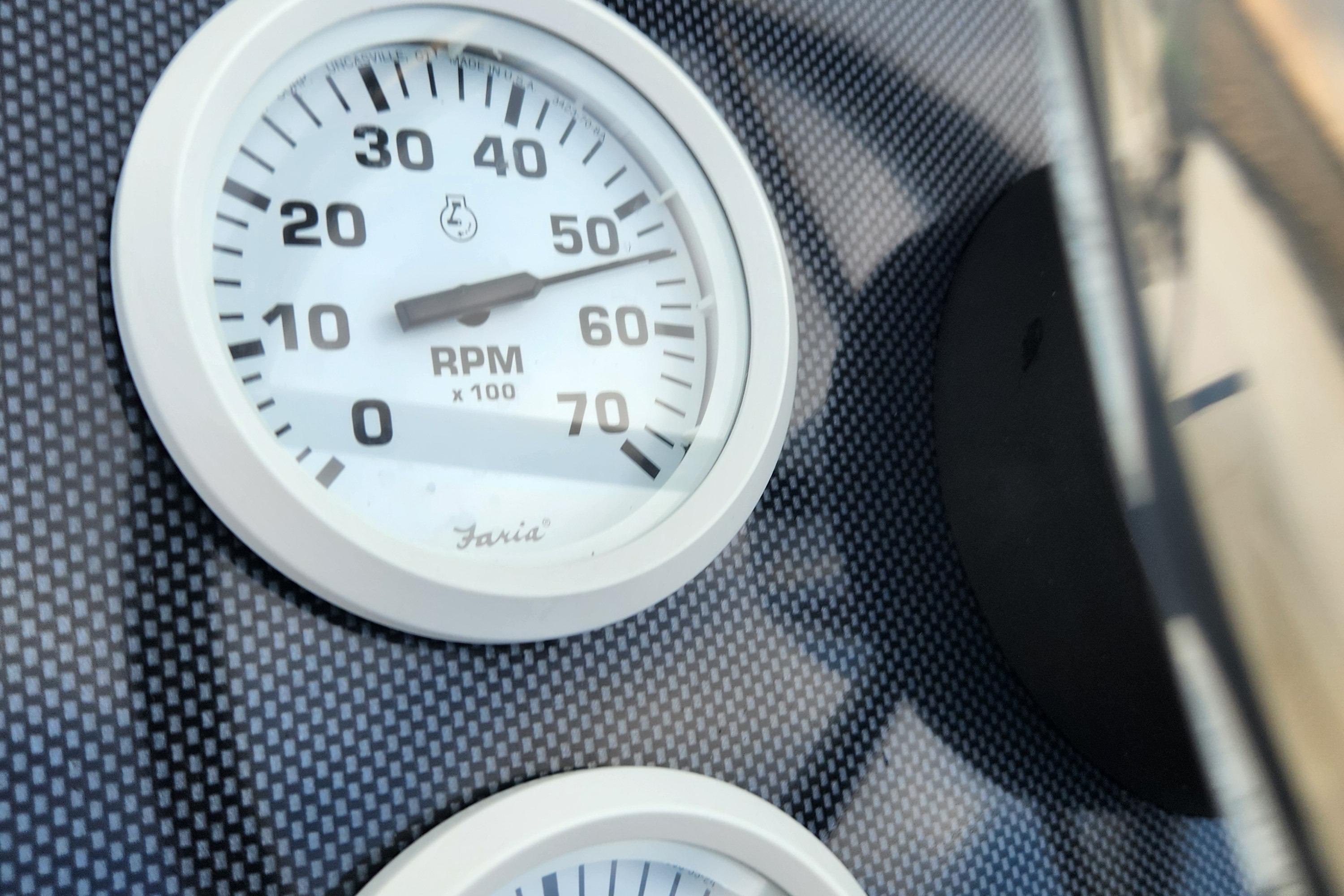 Close-up of RPM gauge on 2019 Novurania DL 400 boat dashboard.