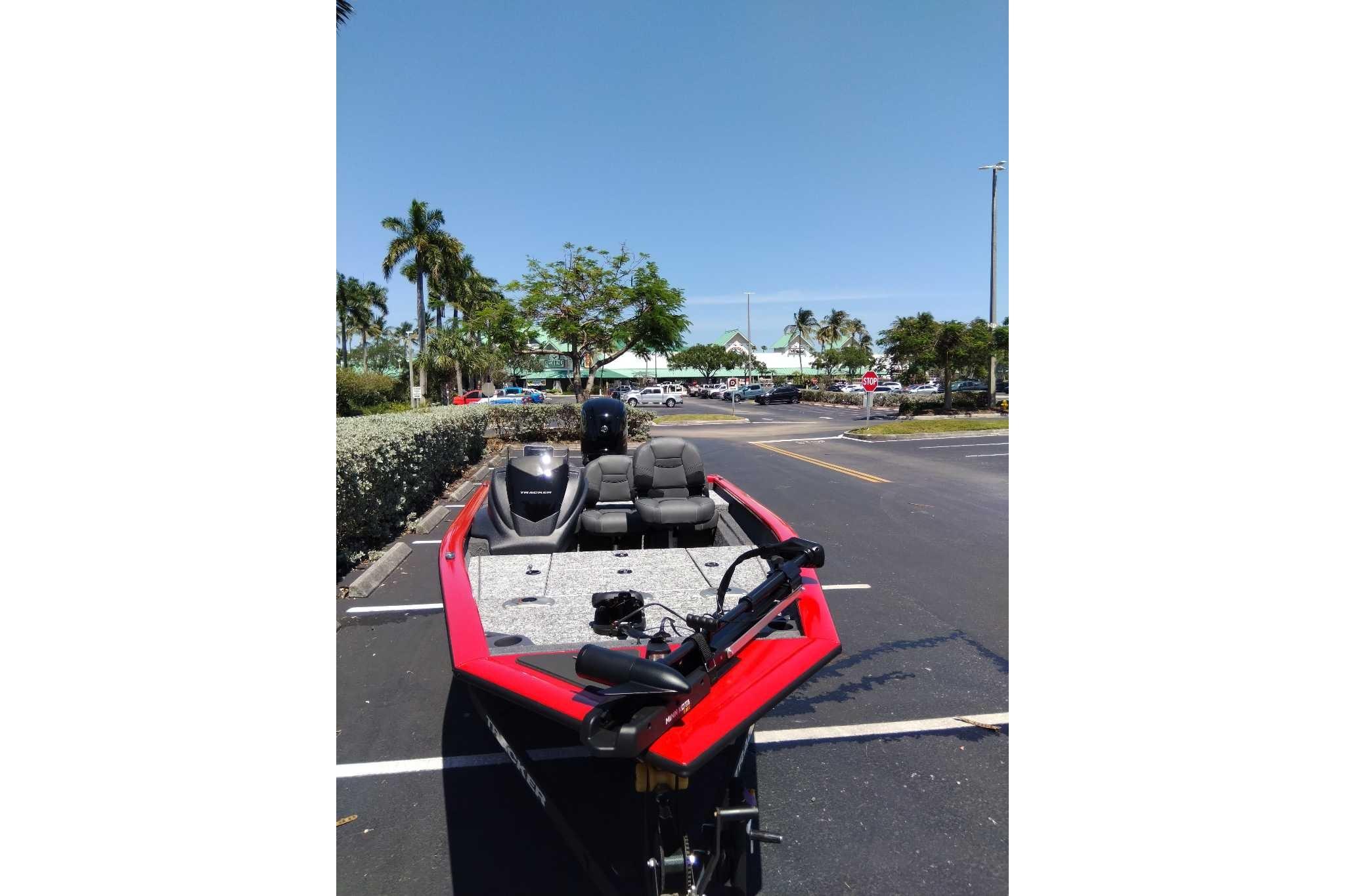 2026 Tracker Pro Team 175 Crappie Edition boat parked outdoors on a sunny day.