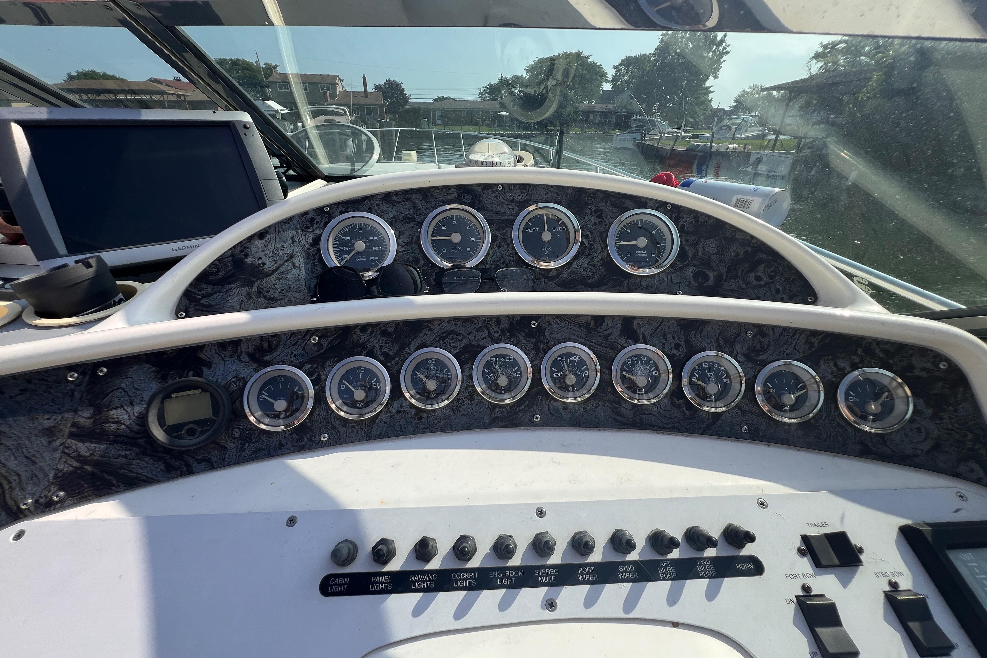 Dashboard of 2000 Wellcraft 45 Excalibur boat with gauges and controls.