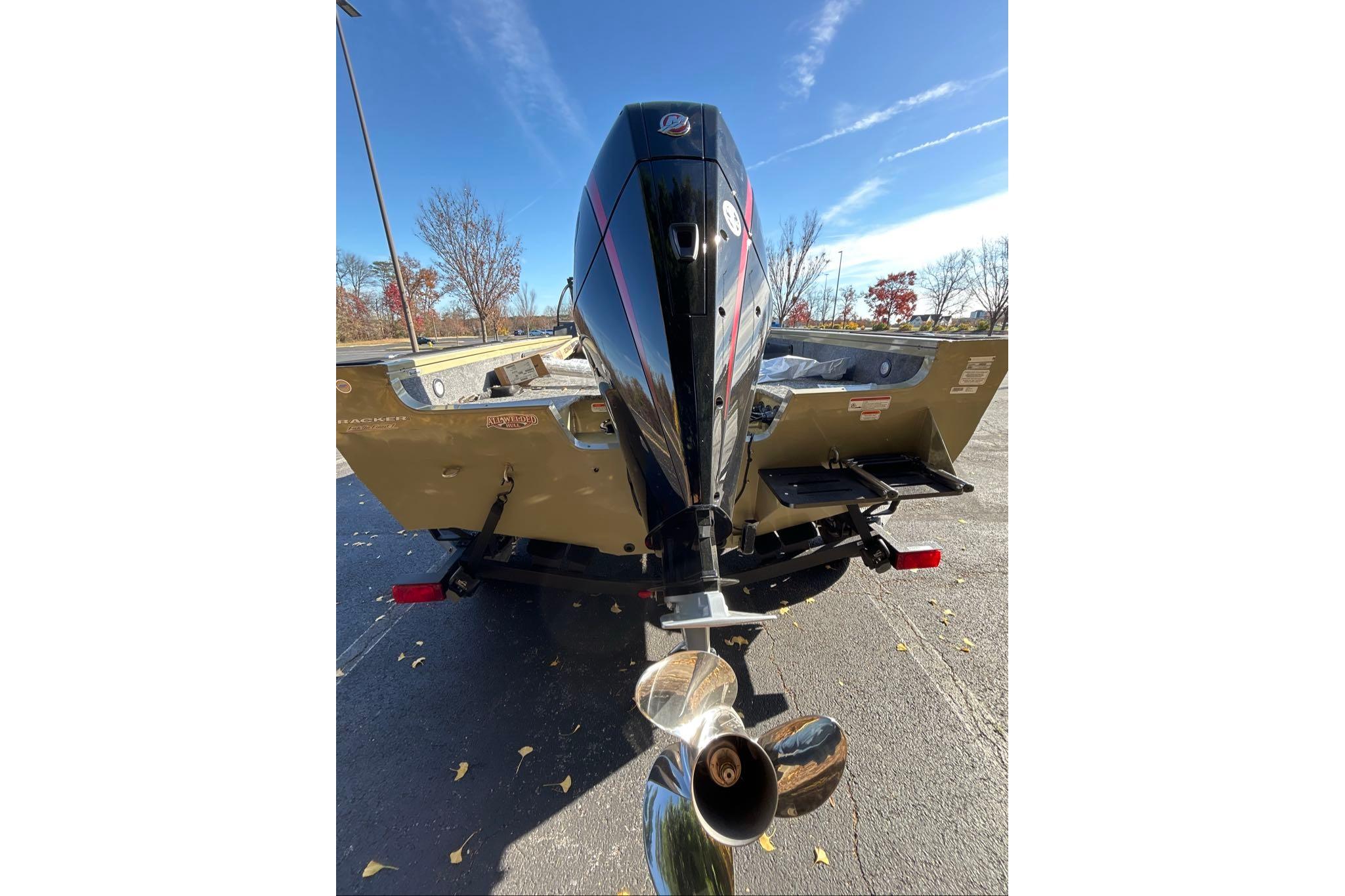 2026 Tracker Targa V-19 Combo boat rear view with outboard motor and propeller.