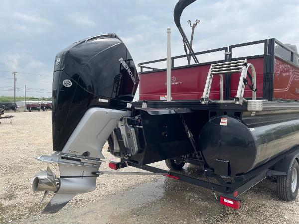 2023 Regency 250DL3 boat with Mercury outboard motor on a trailer.