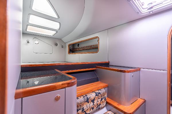 Interior of 2025 Shuttleworth 52 AeroRig yacht, featuring modern design and wood accents.