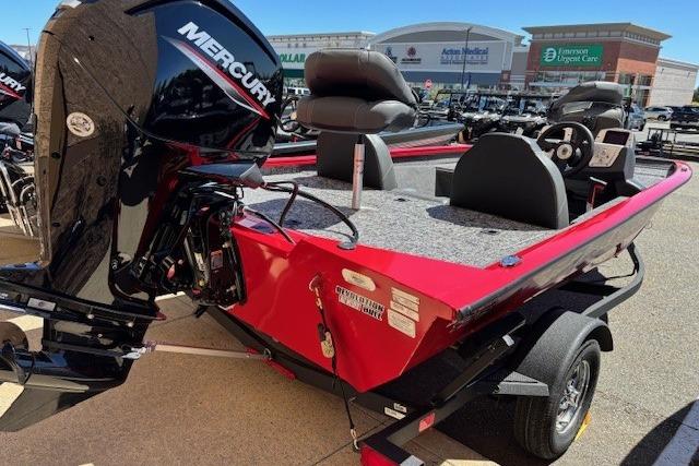 2026 Tracker Pro Team 175 boat with Mercury engine, displayed outdoors.