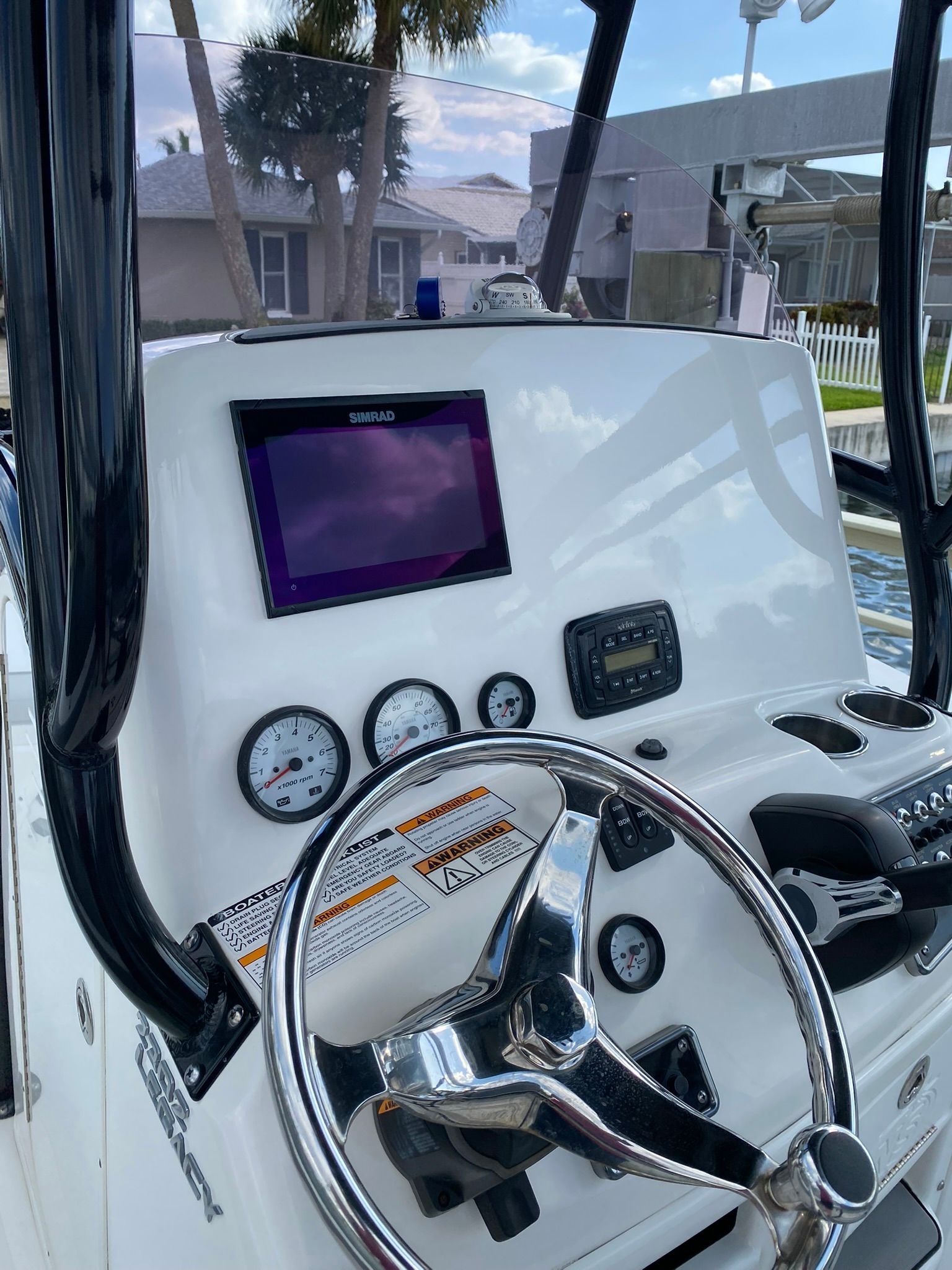 2021 NauticStar Legacy boat helm with instruments and controls.