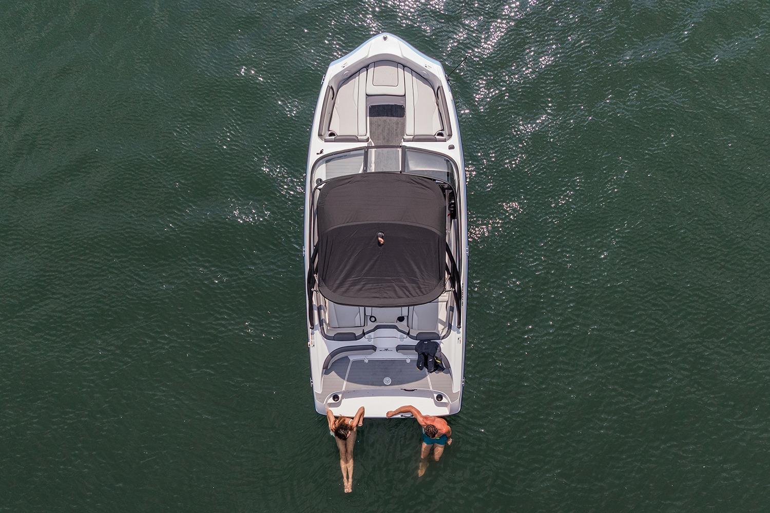 Manufacturer Provided Image: Overhead view of 2026 Yamaha Boats AR190 on water with two people swimming.
