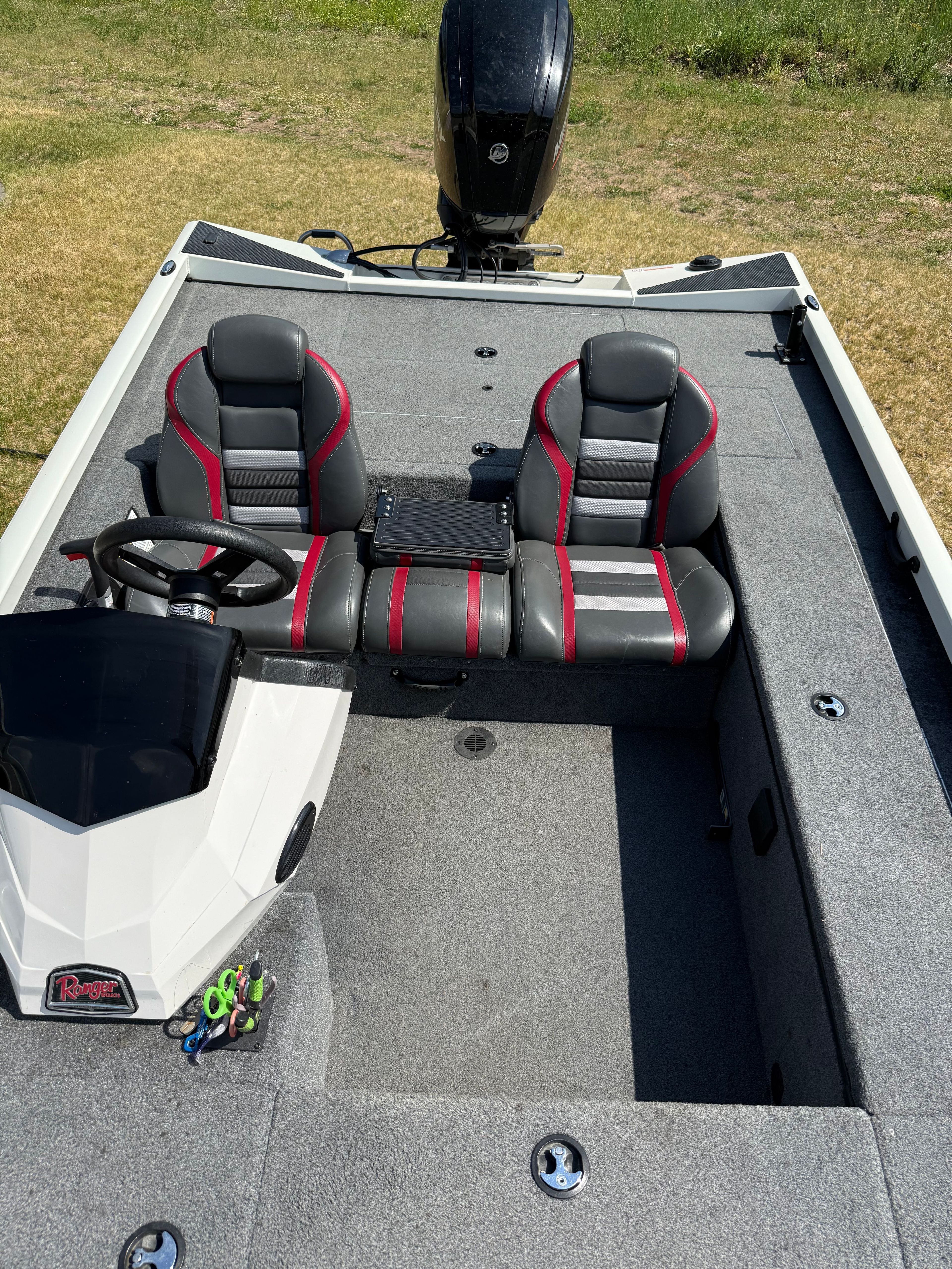 2022 Ranger RT188C boat with gray and red seats.