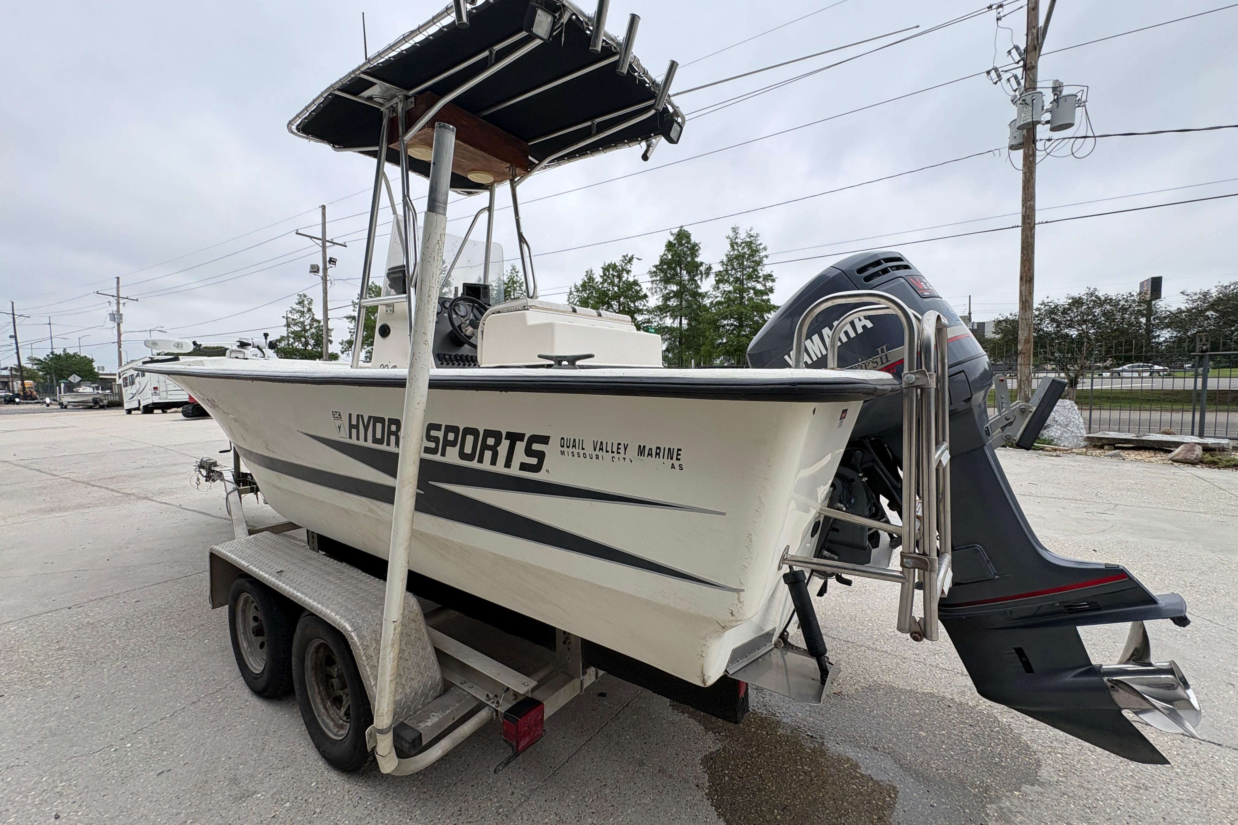 1998 Hydra-Sports 22 Ocean CC boat on trailer with Yamaha outboard motor.