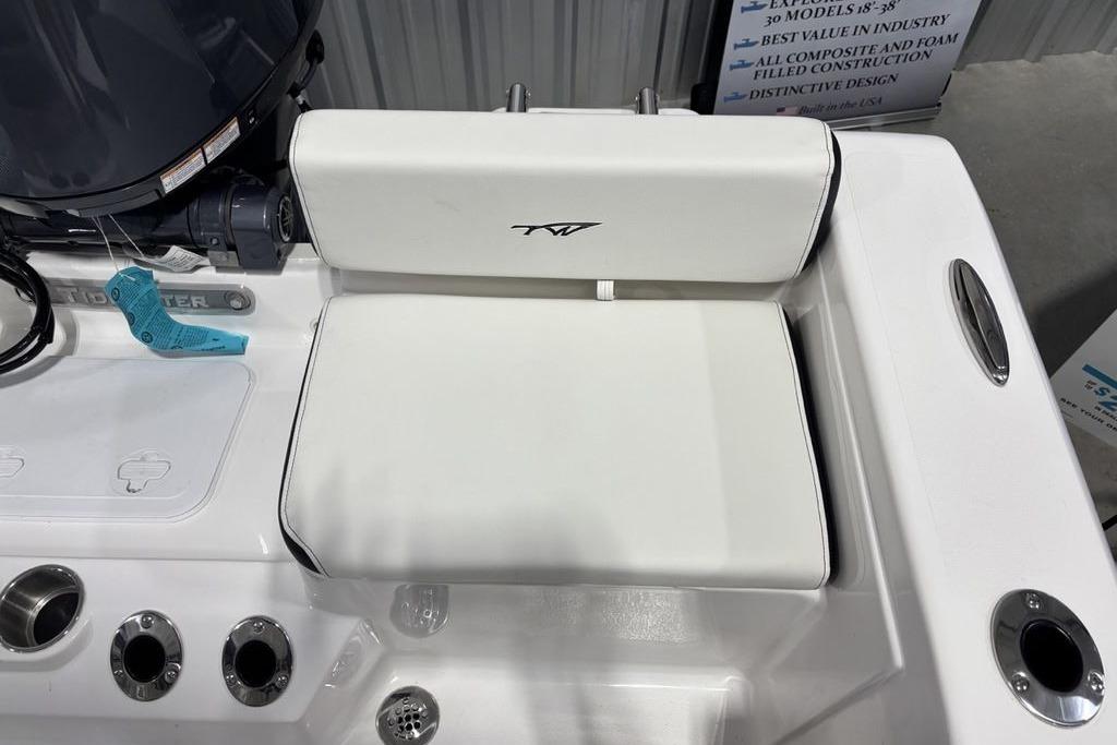 2026 Tidewater 198 CC Adventure boat seat with white upholstery and sleek design.