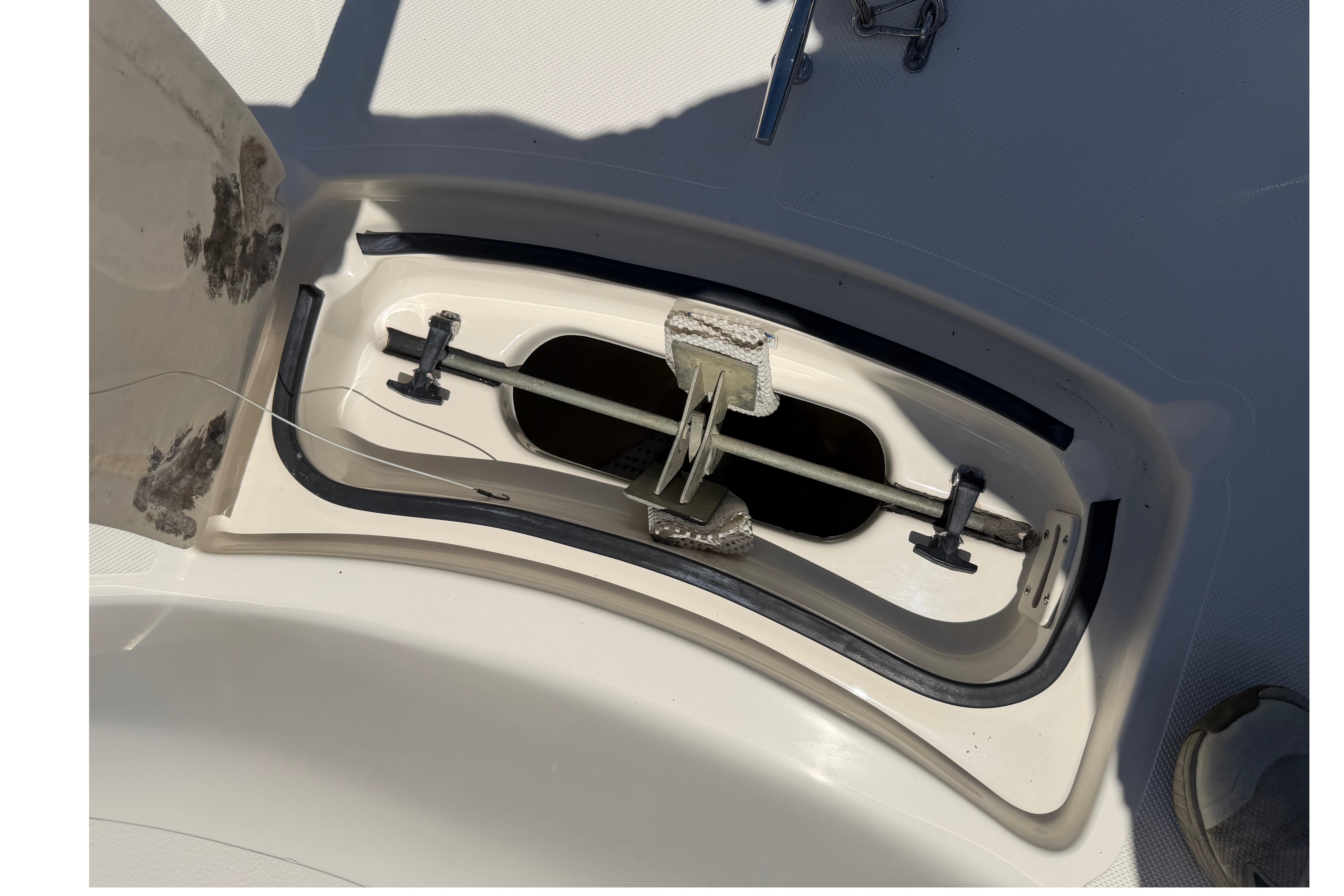 Open anchor locker on 2010 Pursuit OS 255 Offshore boat.
