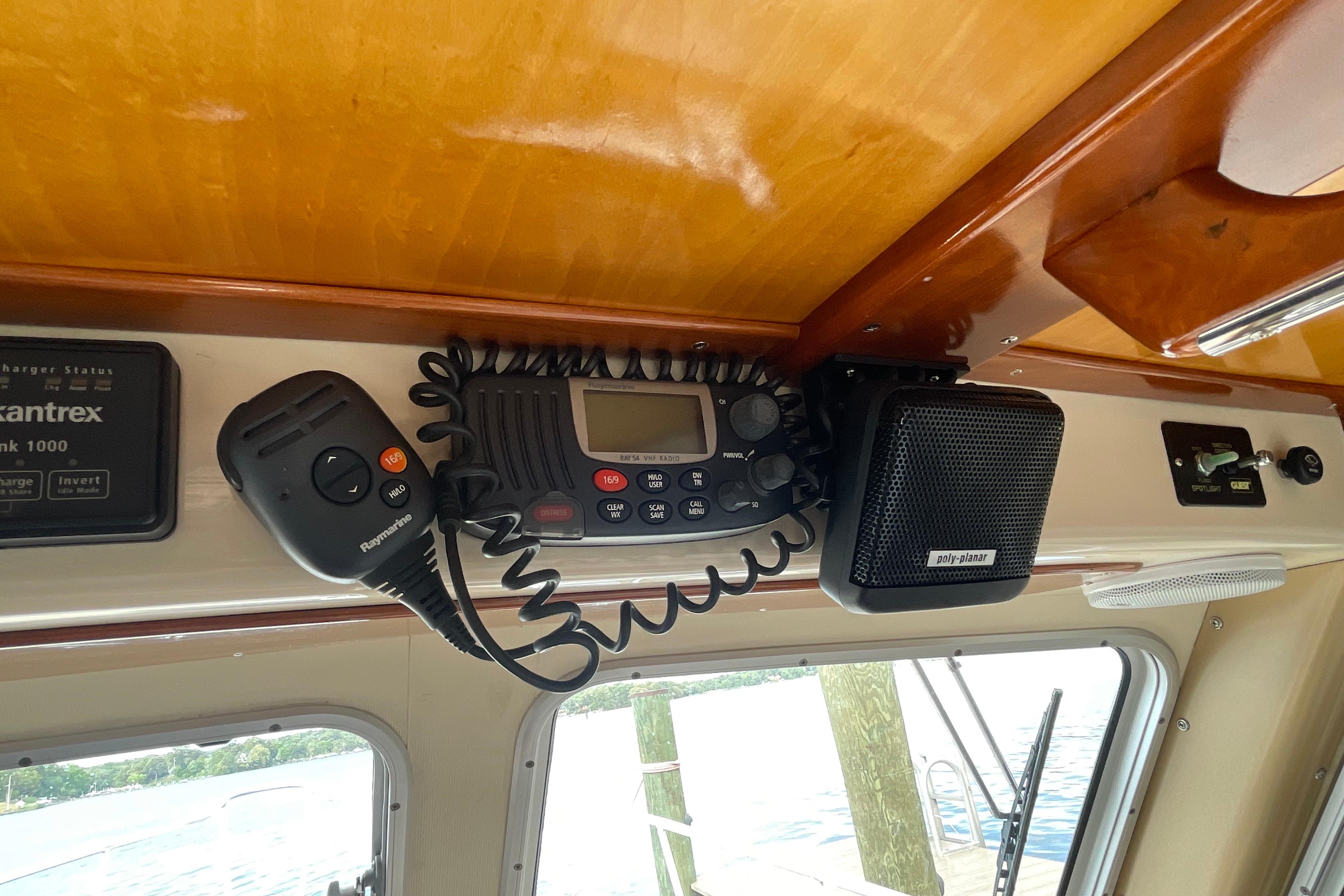 Interior of 2005 Fox Island Thirty Sedan Cruiser with radio and speaker system.