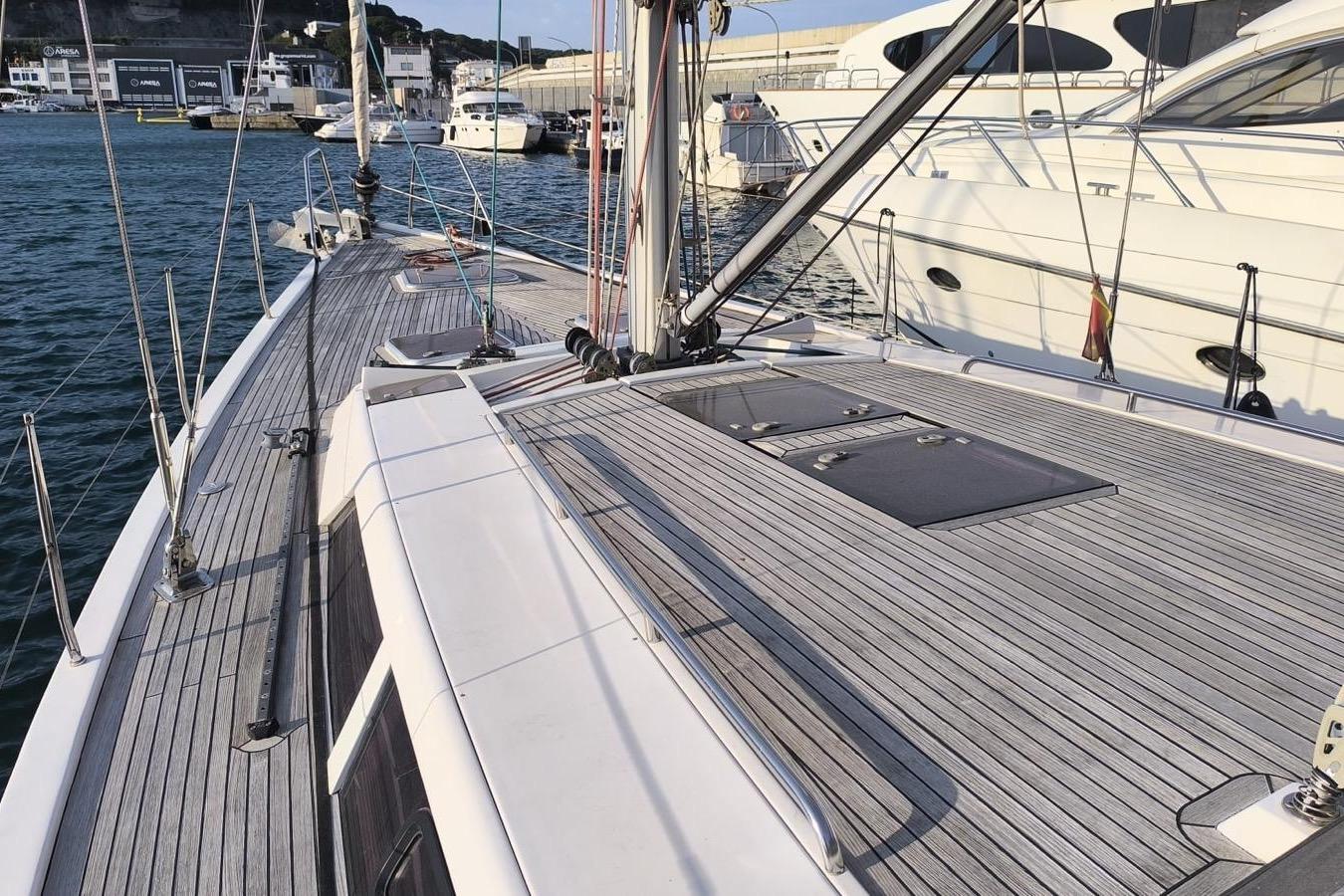 2007 Hanse 470e sailboat deck with sleek design, docked in marina.