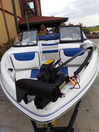 2024 Tahoe 185 S boat with blue and white interior, featuring a mounted trolling motor.