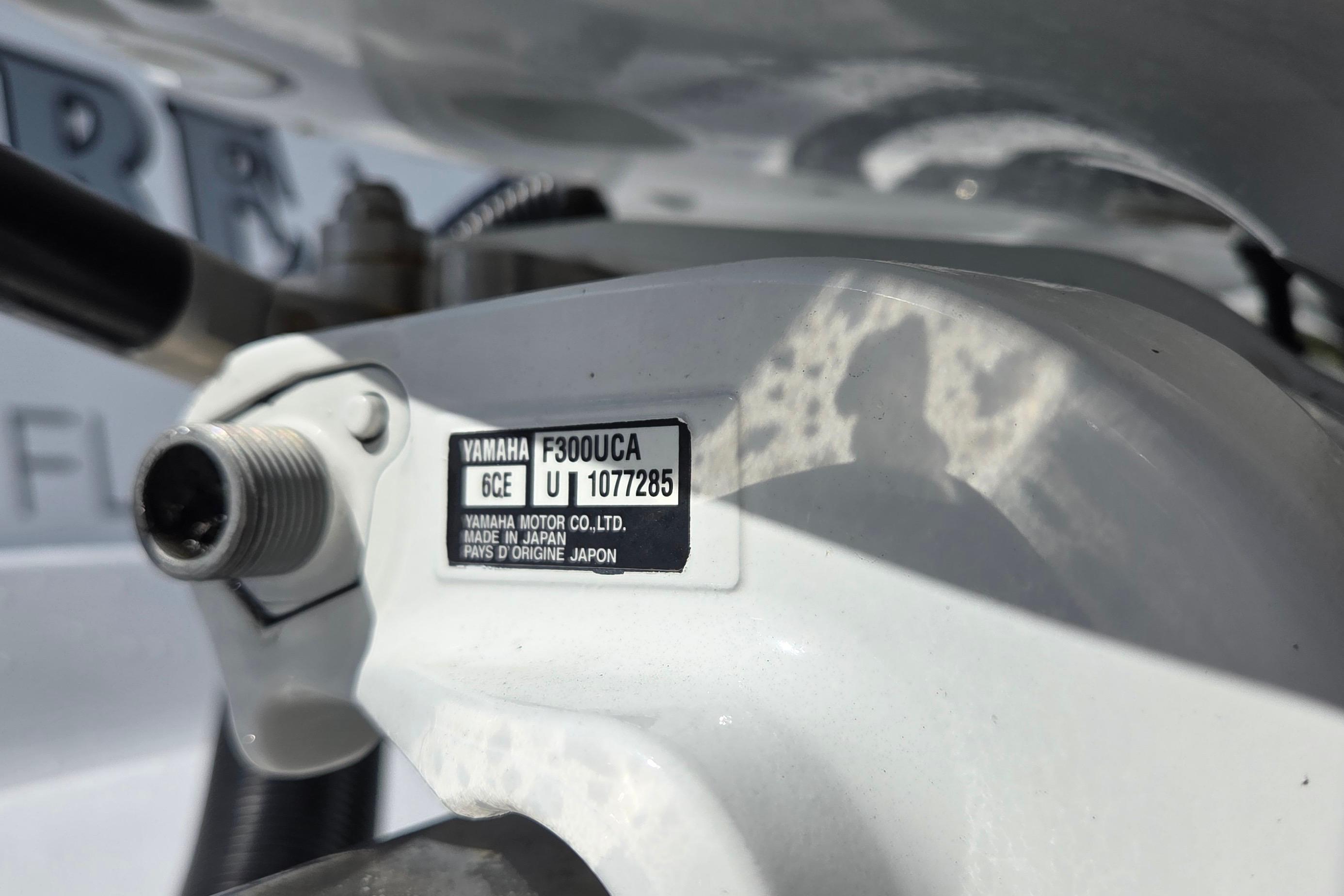 Close-up of Yamaha F300UCA engine label on 2021 Sportsman Open 352 Center Console.