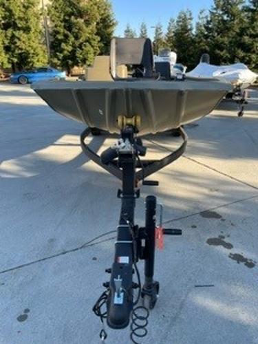 2024 Tracker Grizzly 1754 SC boat on trailer, outdoor setting.