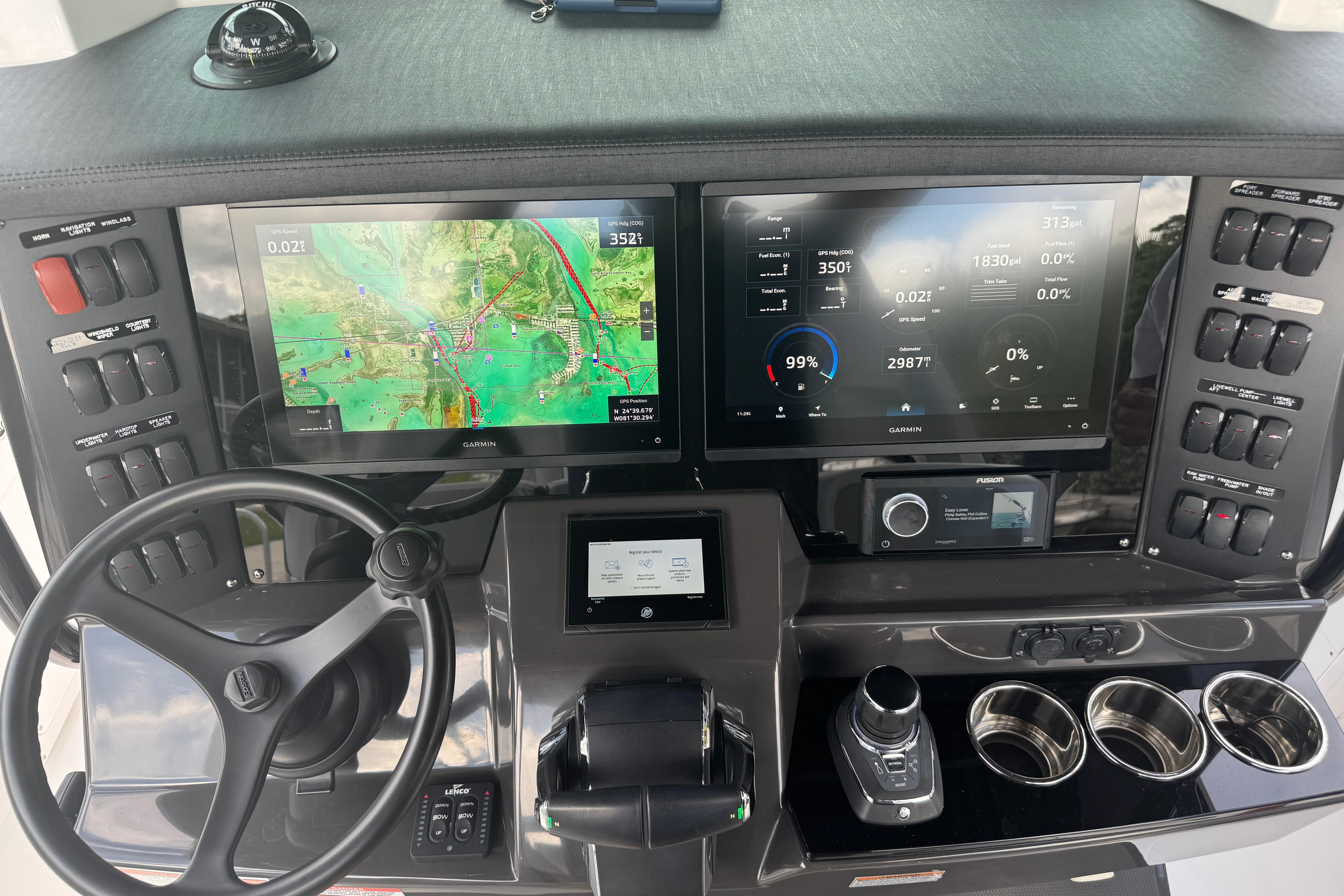 2024 Blackfin 332 CC helm with advanced navigation and control systems.