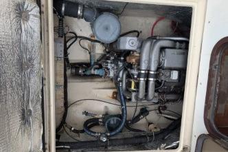 Engine compartment of a 2008 Ranger 25, showcasing mechanical components.