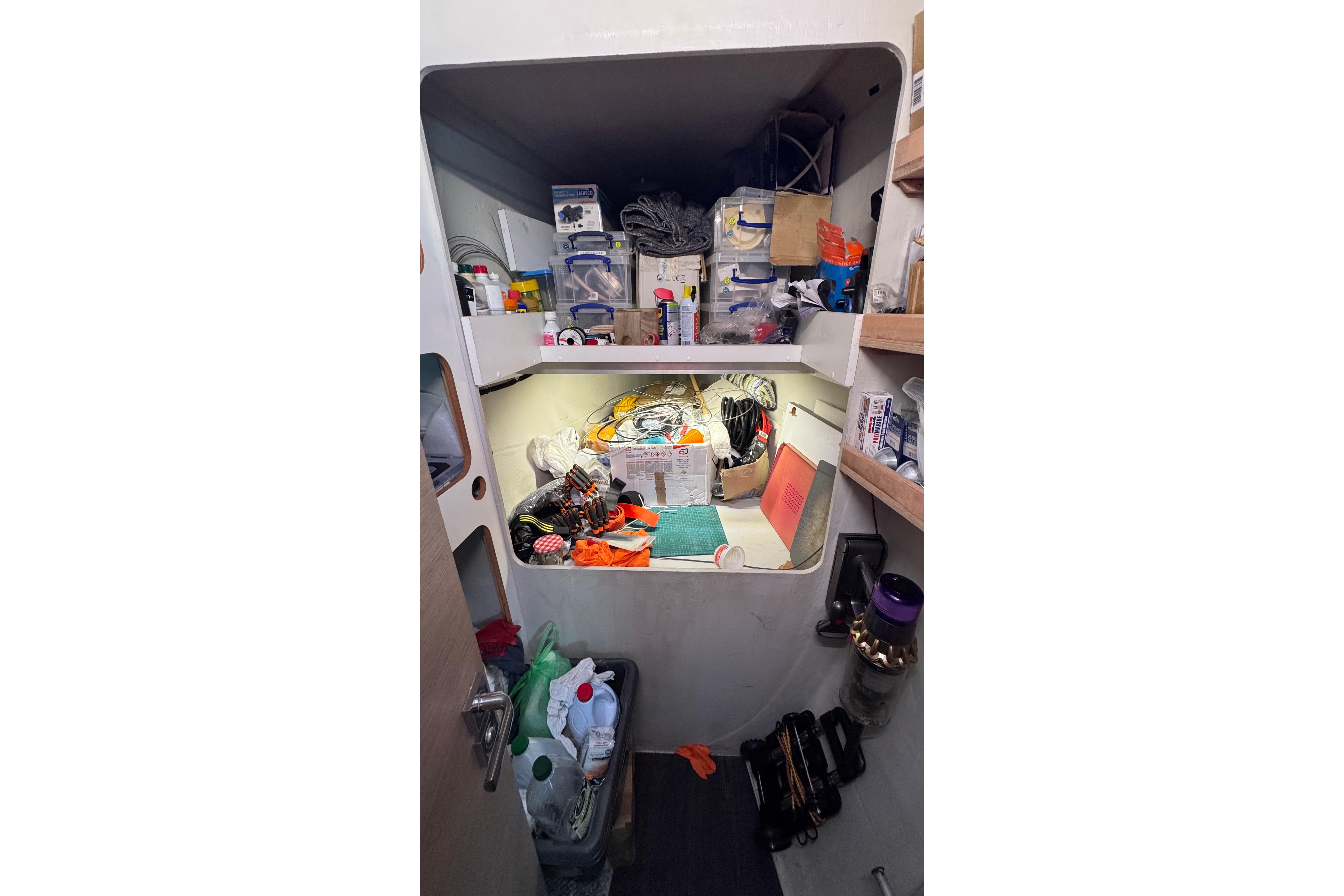 Storage area inside a 2020 Fountaine Pajot Saona 47, filled with various supplies and equipment.