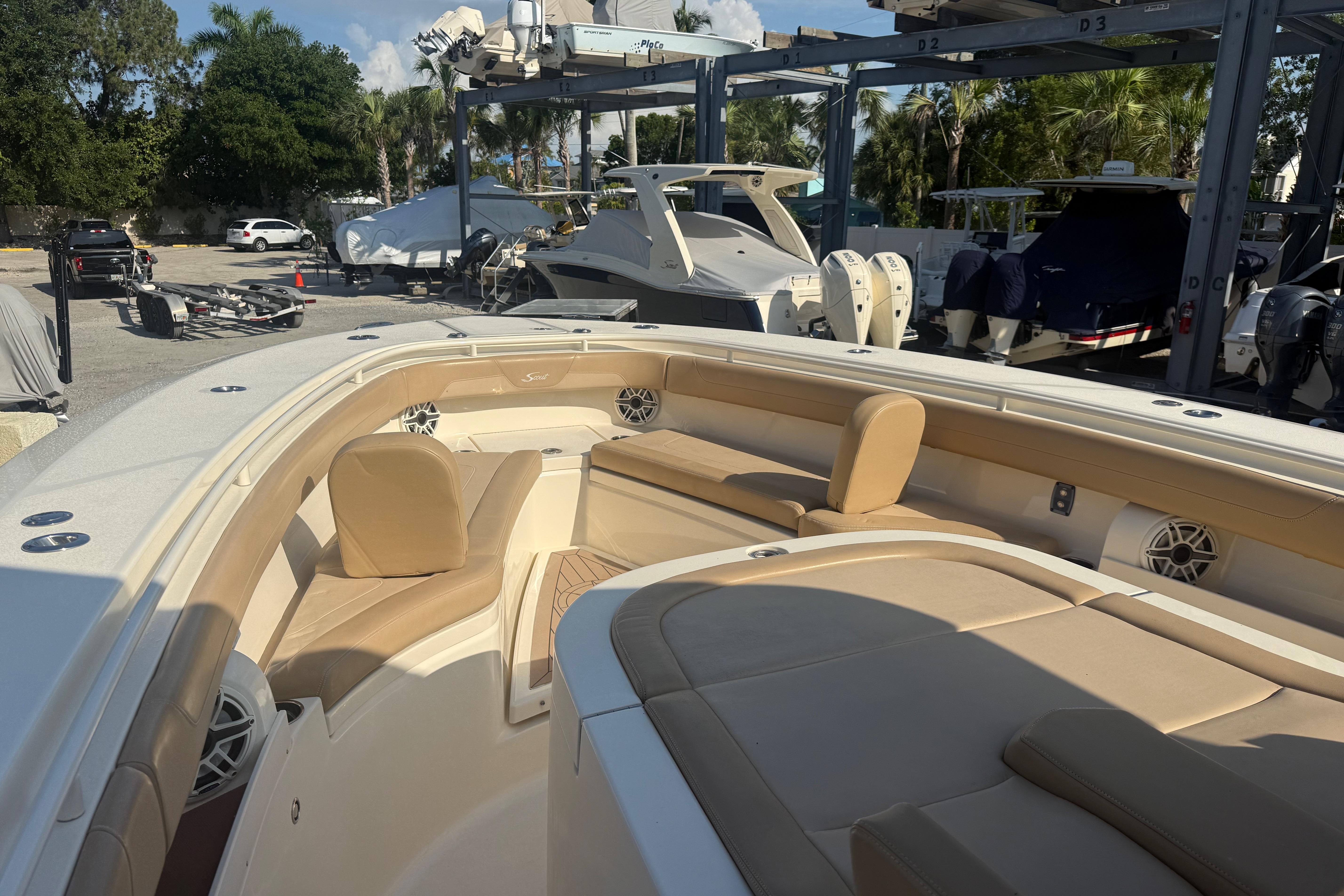 2022 Scout 355 LXF boat interior with beige seating and modern design.