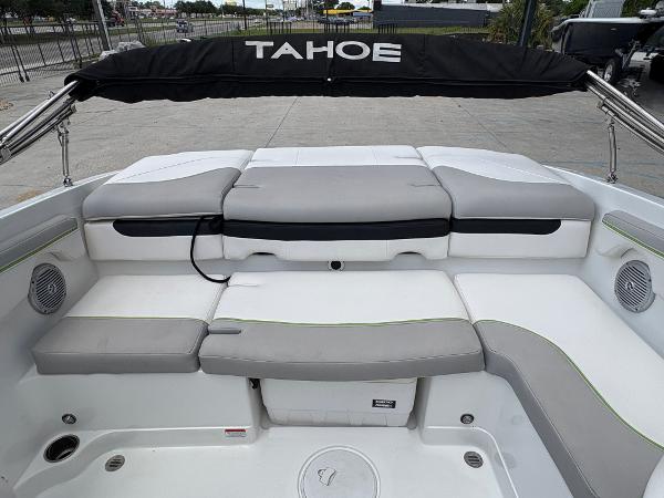 2019 Tahoe 700 boat interior with cushioned seating and canopy.