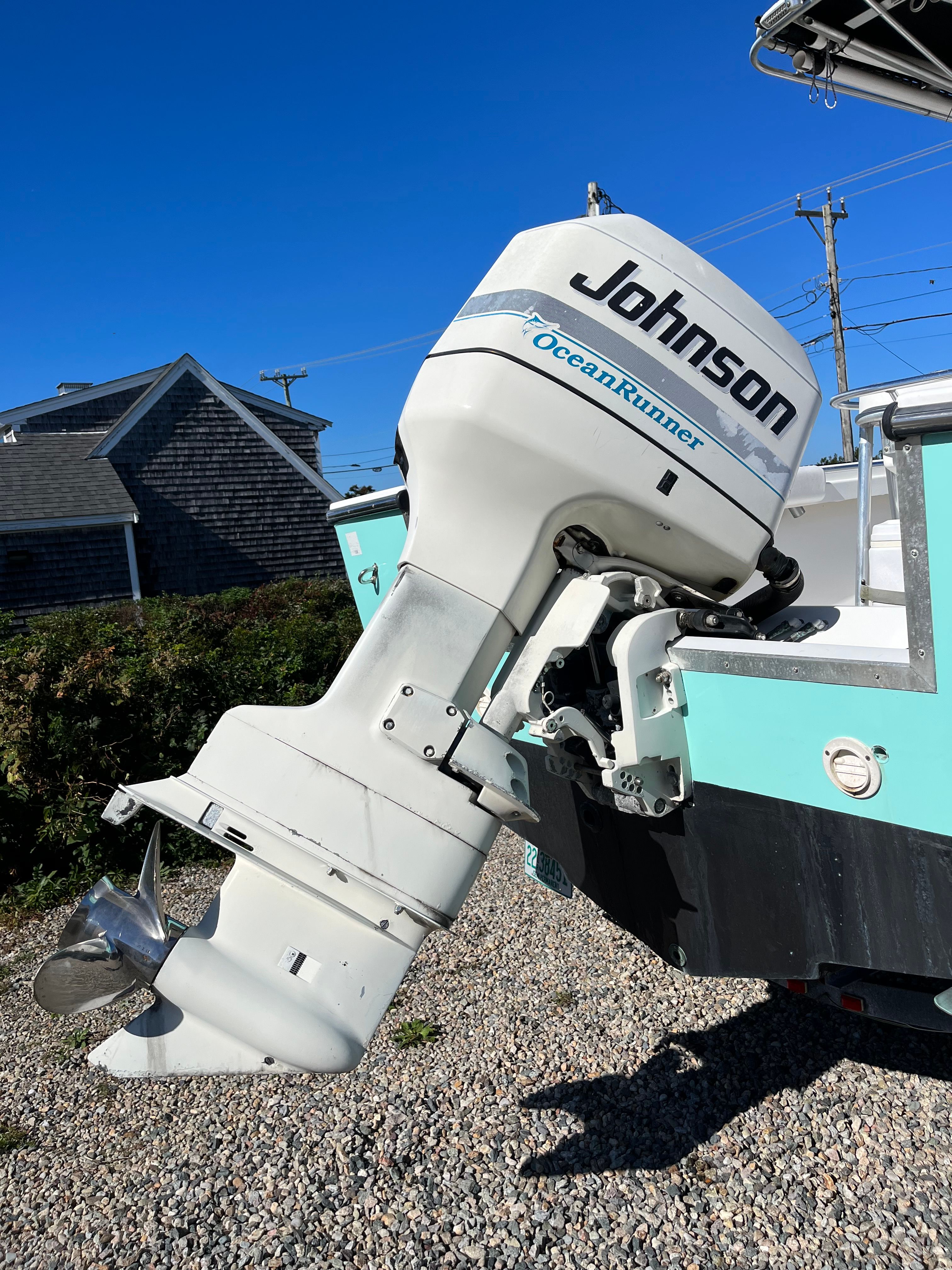 Johnson OceanRunner outboard motor on SeaCraft boat, model SXCRB730H001, year 2001.