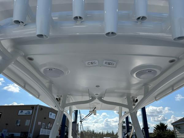 2025 Southport 33 FE boat ceiling with rod holders and speakers.