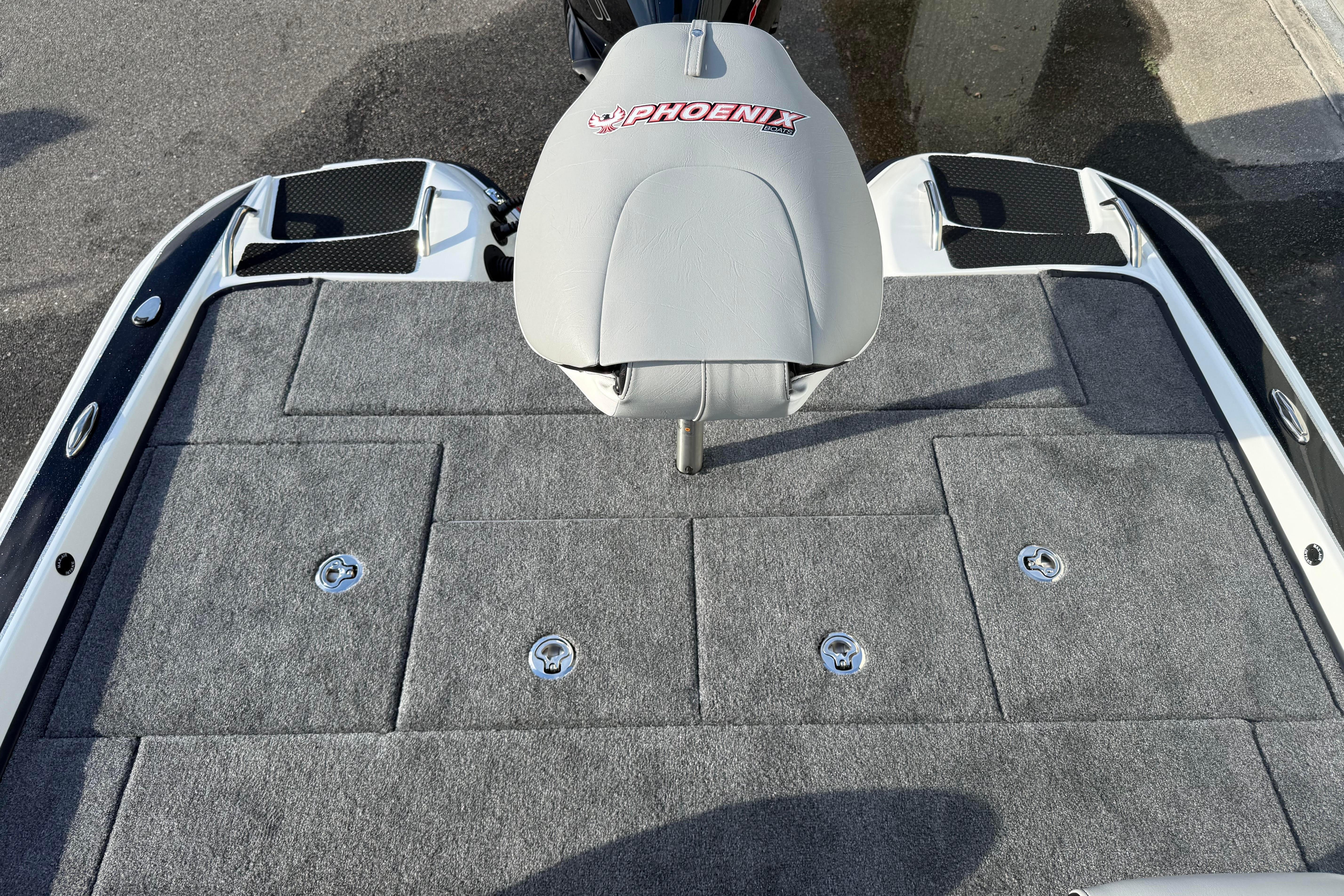 2027 Phoenix 721 ZXL boat deck with gray carpet and branded seat.